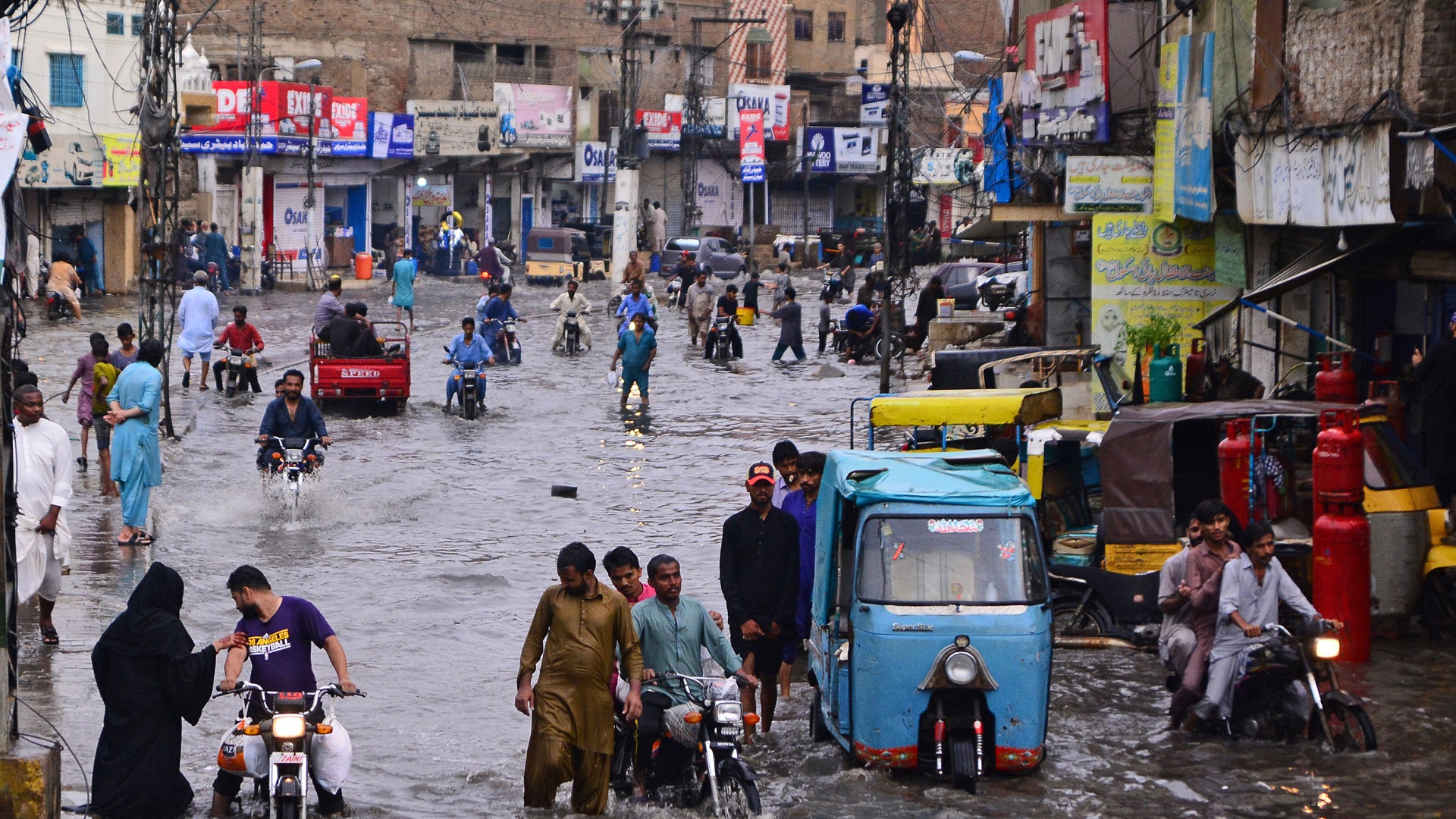 Image for the title: Flash floods wash away dozens of houses in Pakistan 