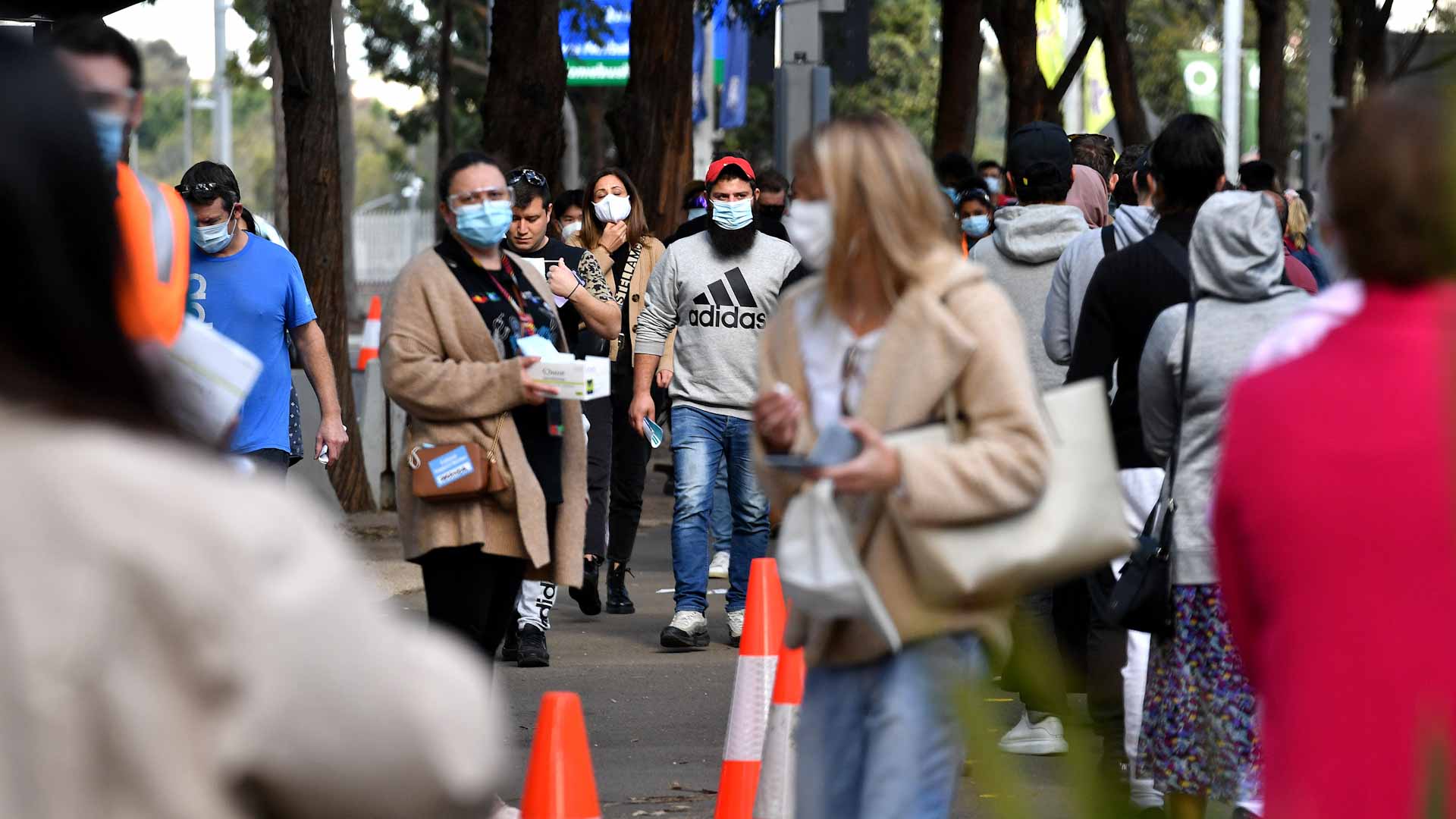 Image for the title: Australia's COVID hospital admissions, deaths rise as virus surges 