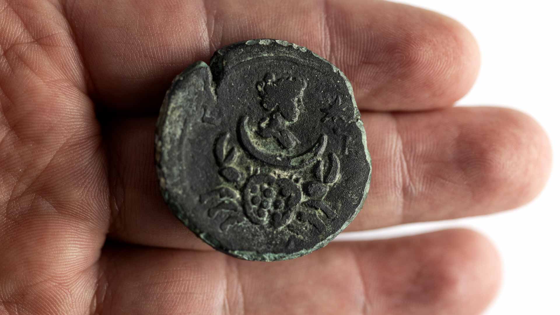 Image for the title: Israel unveils rare 1,900 year-old Roman-era coin 