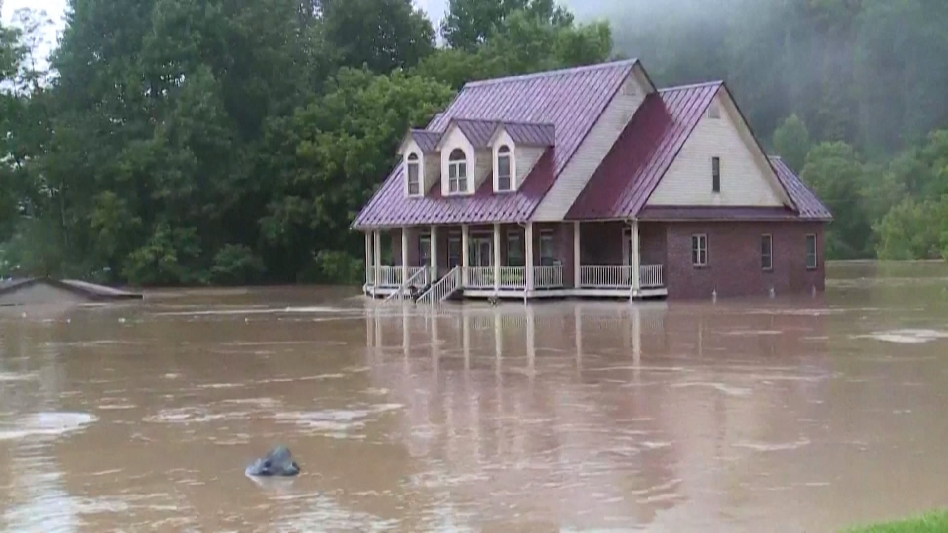 Image for the title: Torrential rains cause 'devastating' flooding in Kentucky 