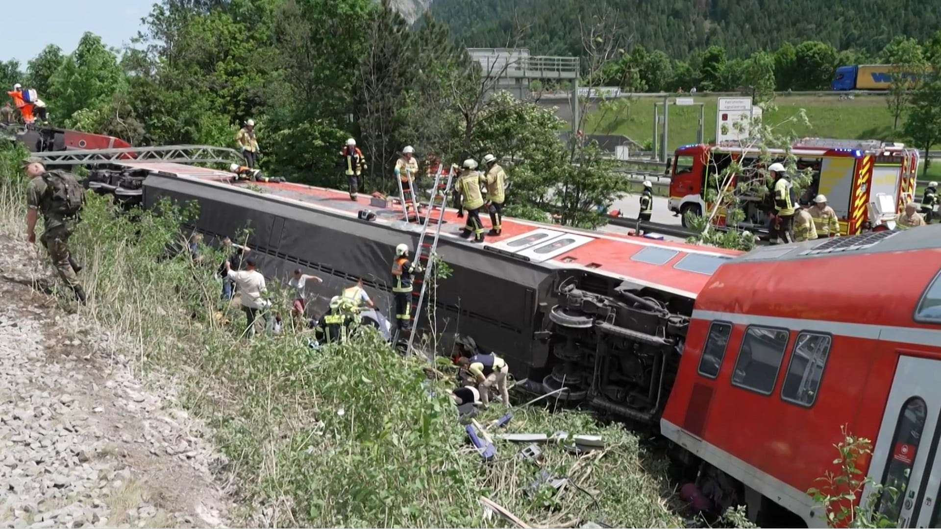 Image for the title: At least three dead as train derails near German resort 