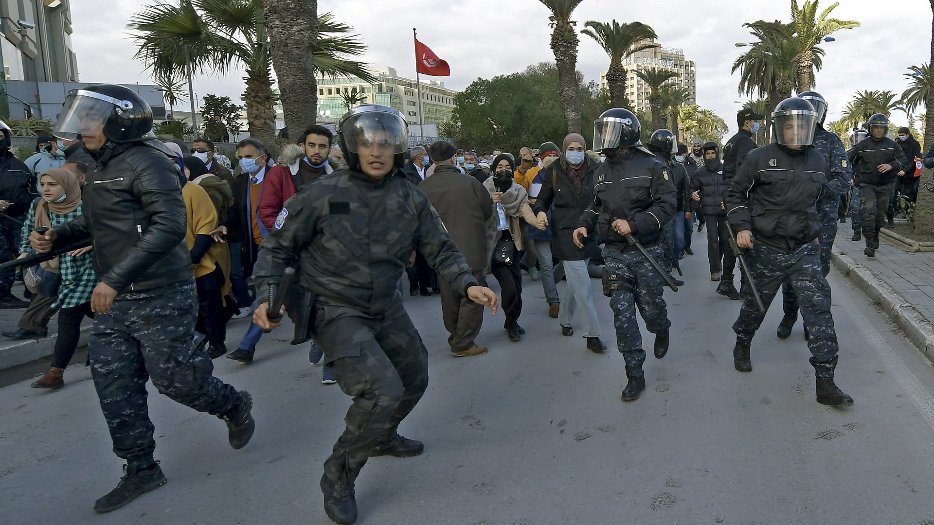 Image for the title: Tunisia police block protests against Saied referendum 