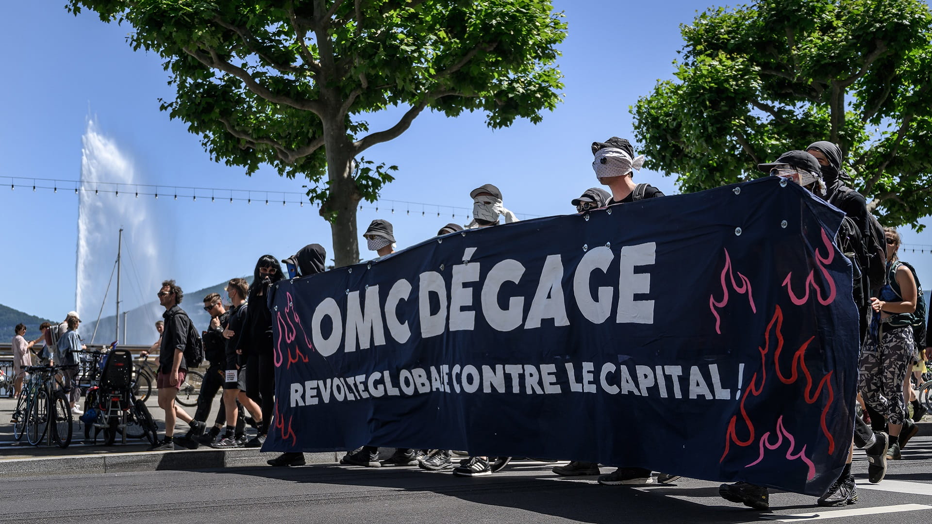 Image for the title: Protesters in Geneva against WTO role in agriculture 