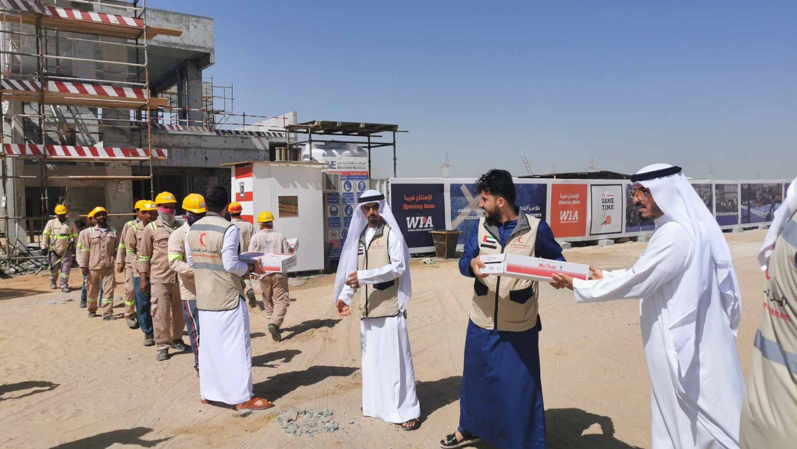 Image for the title: Al Rahmaniyah Council distributes water to workers 