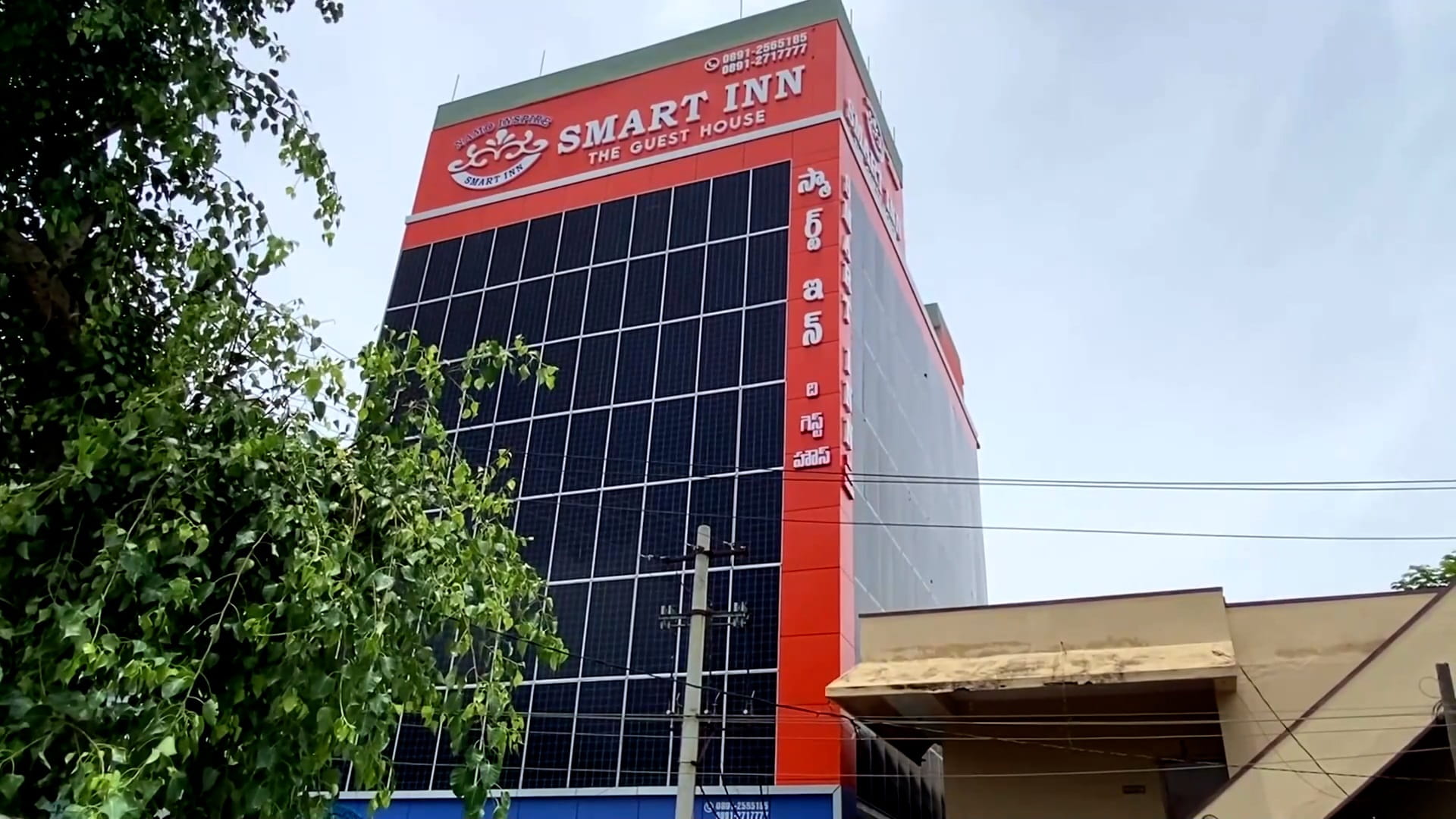 Image for the title: Indian hotelier replaces windowpanes with solar panels 