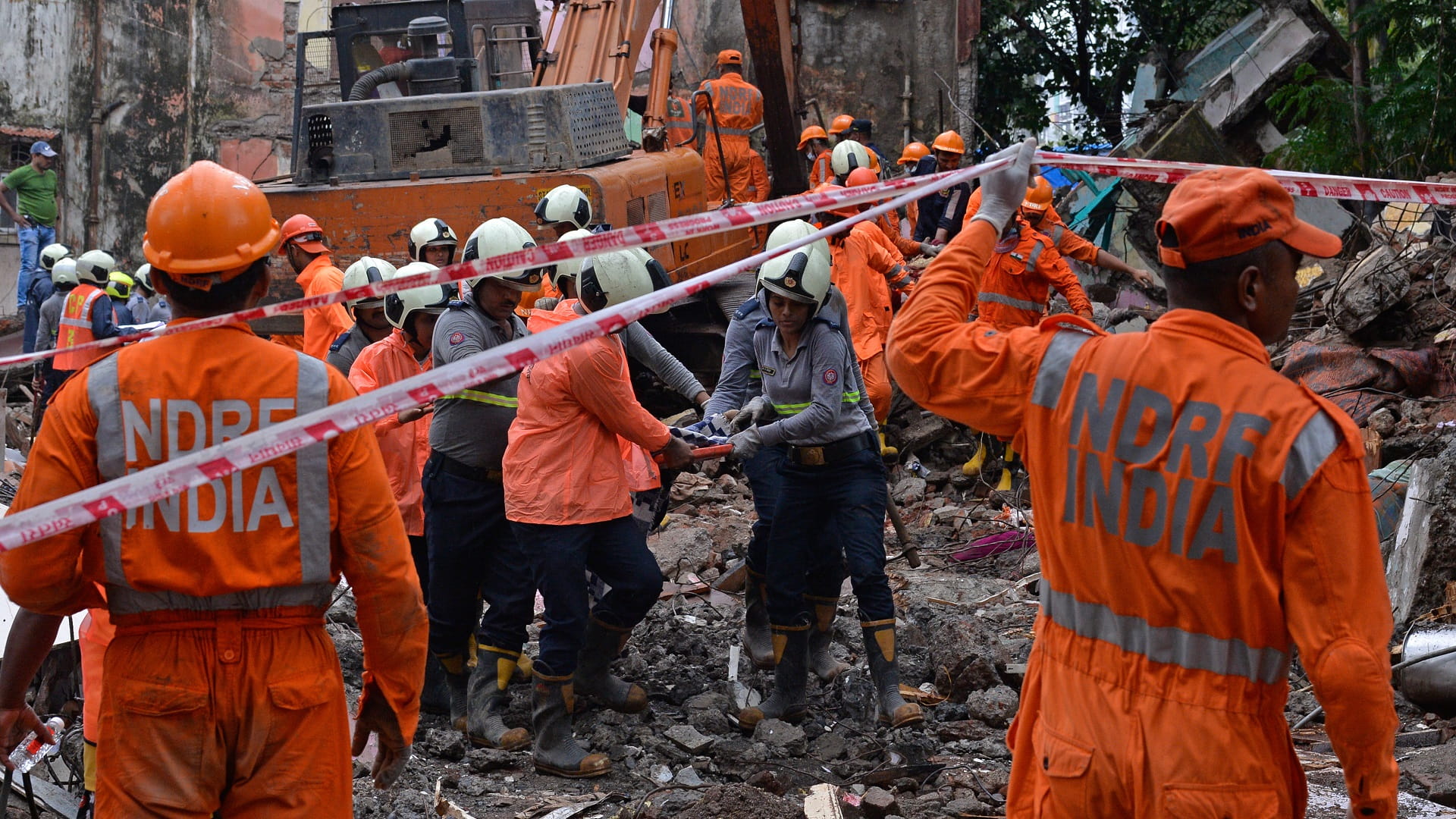 Image for the title: At least 19 dead in India after building collapses in monsoon 