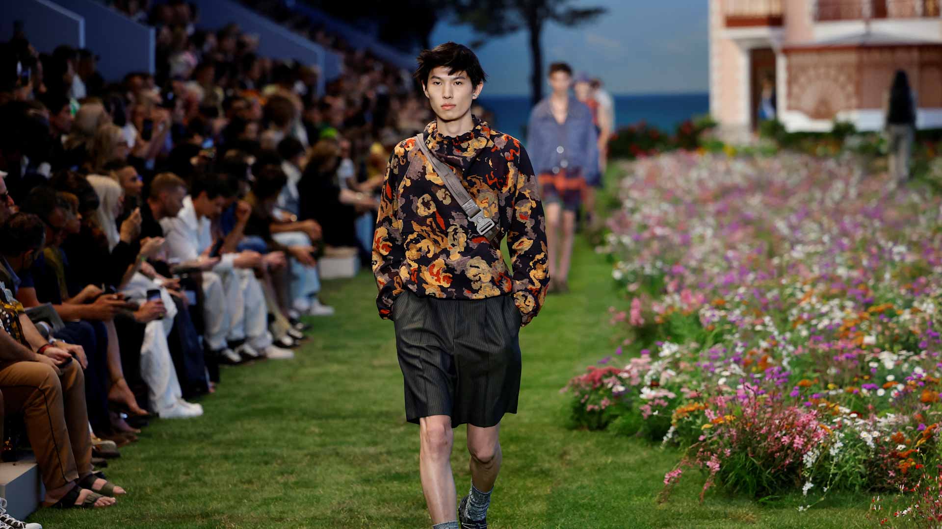 Image for the title: Dior sends models down bucolic garden runway 