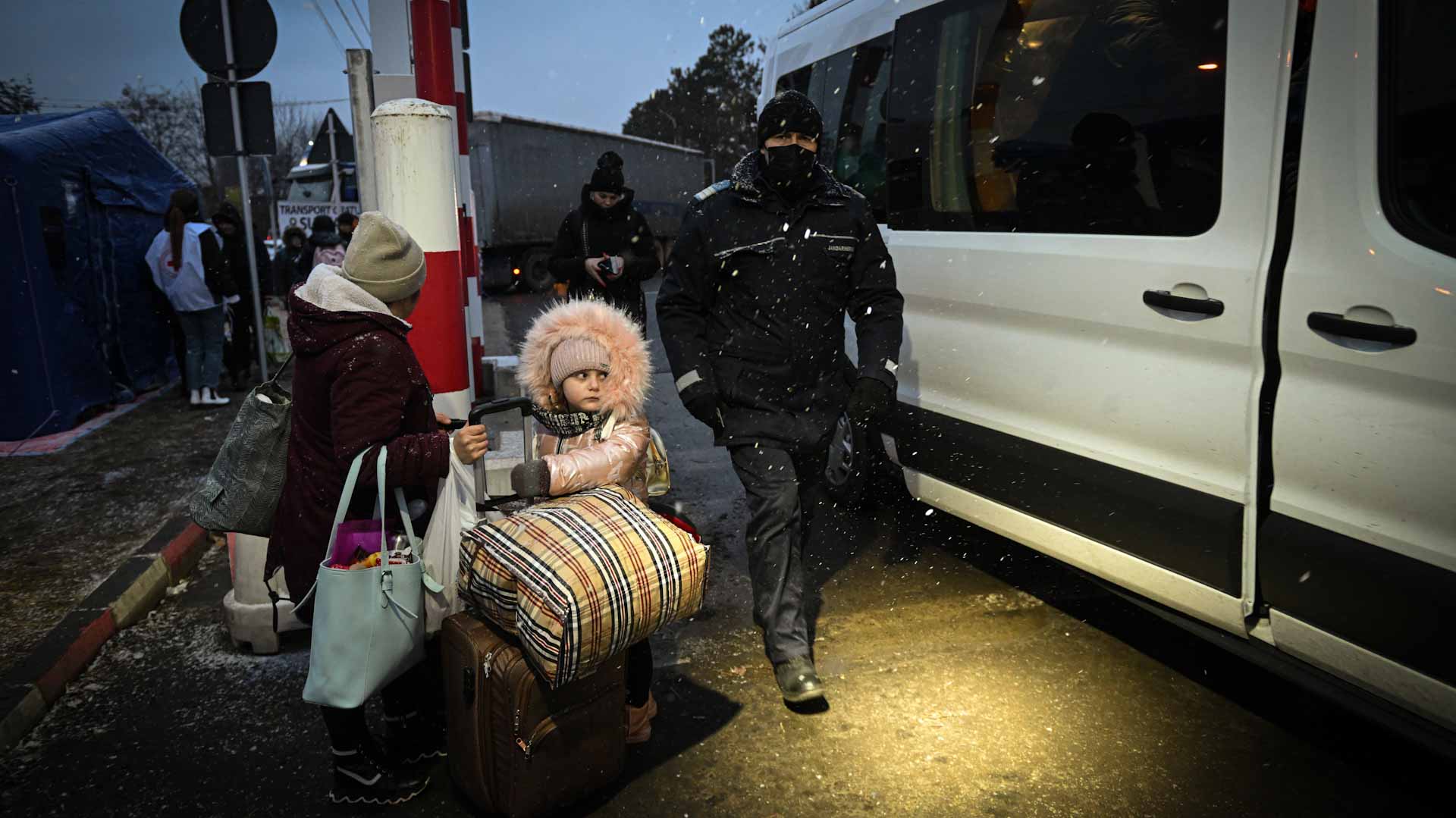 Image for the title: Kyiv civilians huddle in cellars as Russian forces attack 