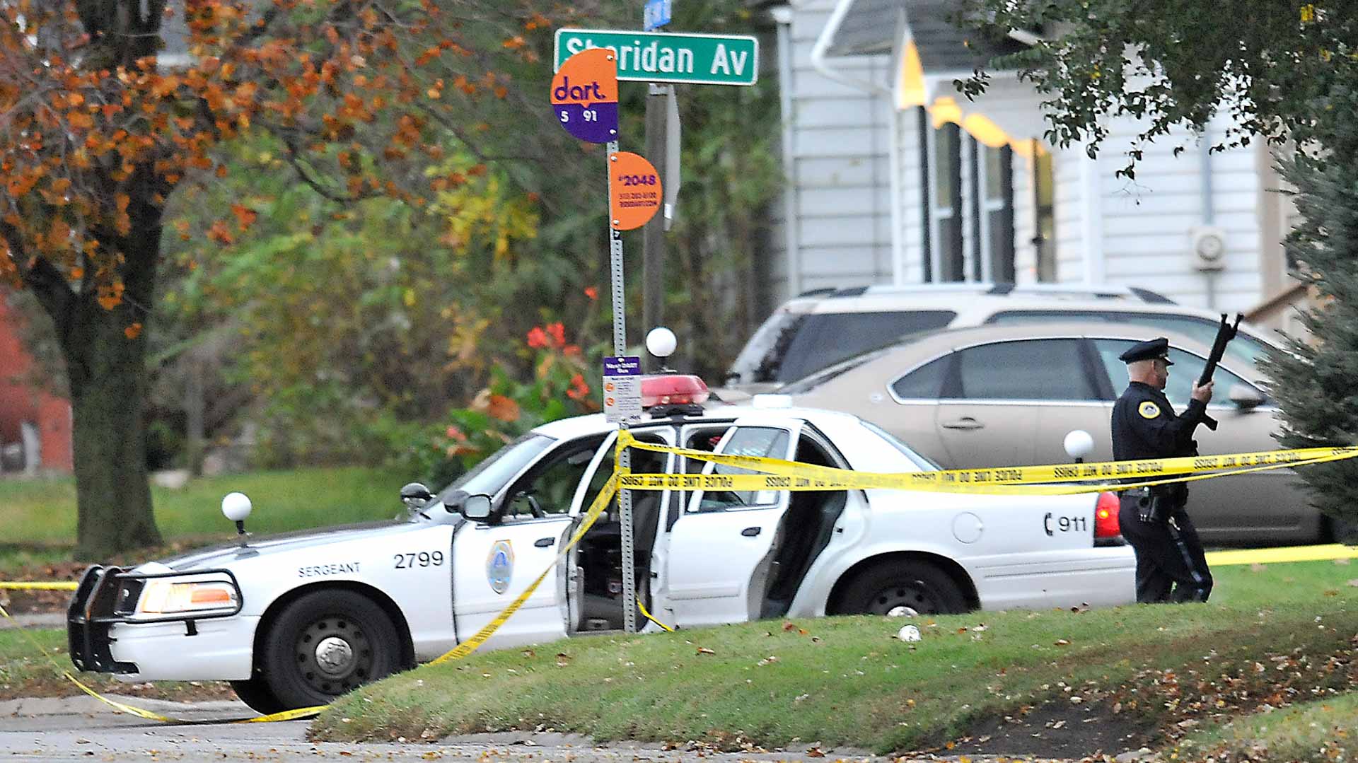 Image for the title: 1 dead, 2 wounded in shooting outside US high school 