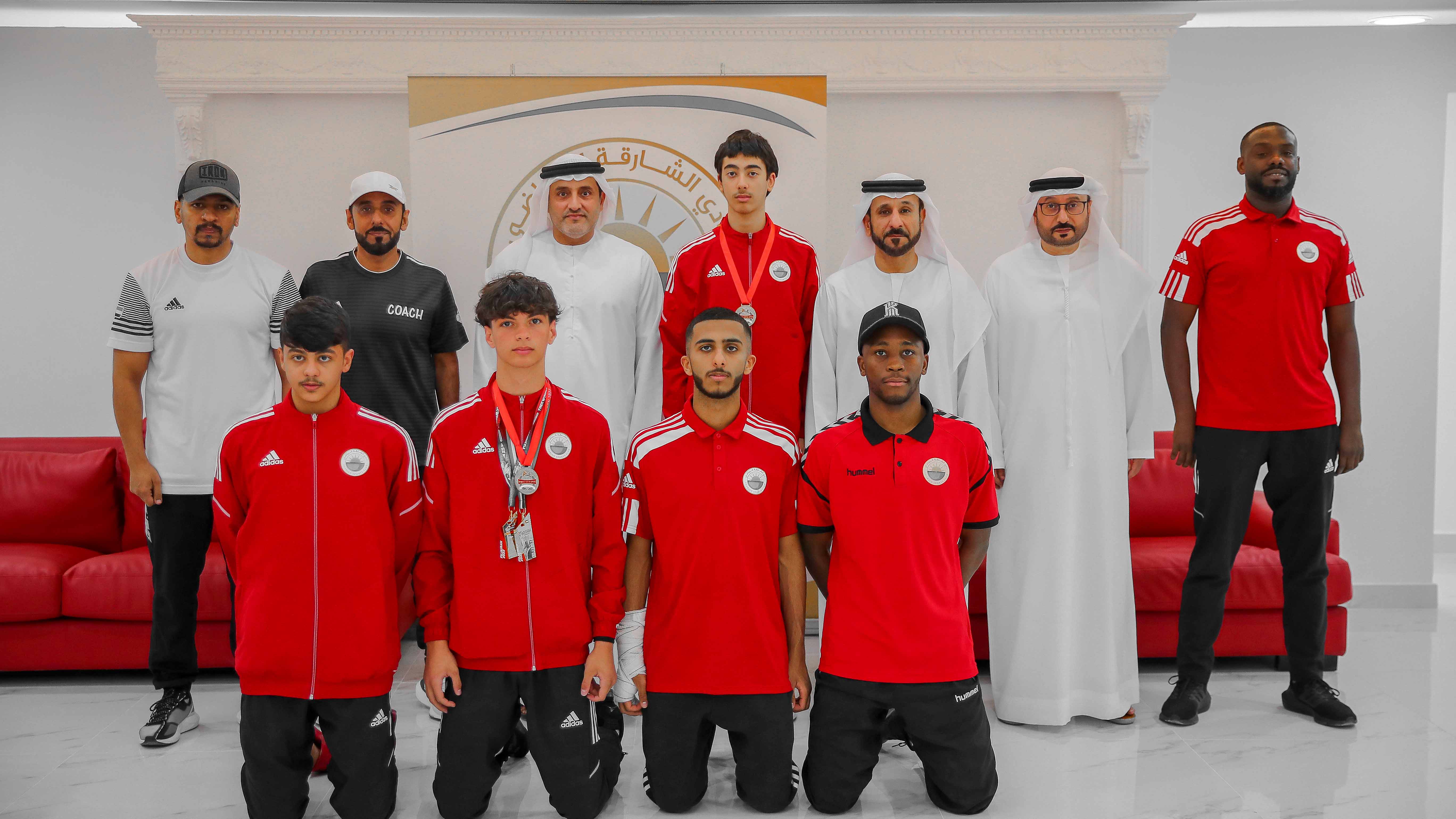 Image for the title: Al Midfa receives club’s taekwondo team 