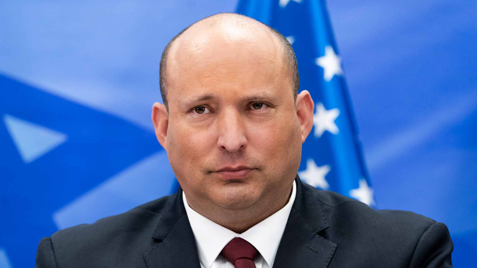 Image for the title: Israeli PM Bennett tests positive for COVID 