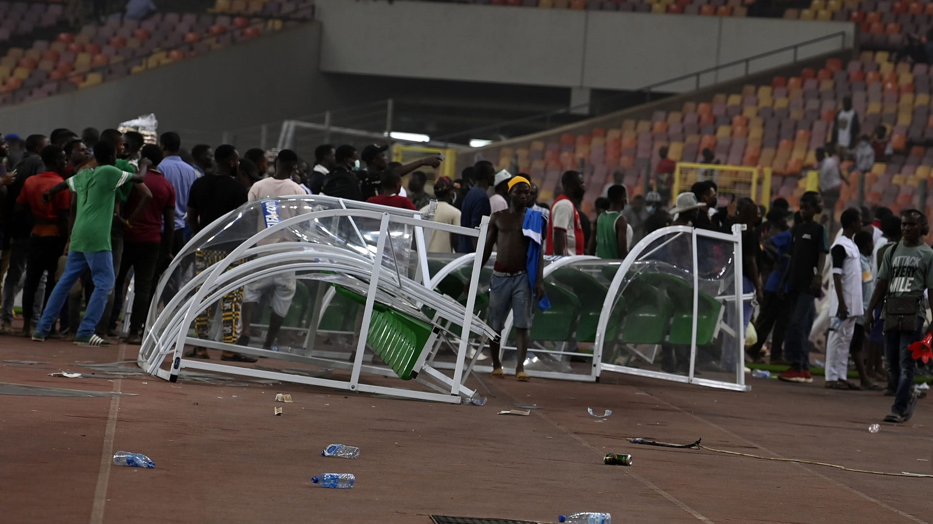 Image for the title: Tear gas fired as Nigeria fans riot over World Cup loss 