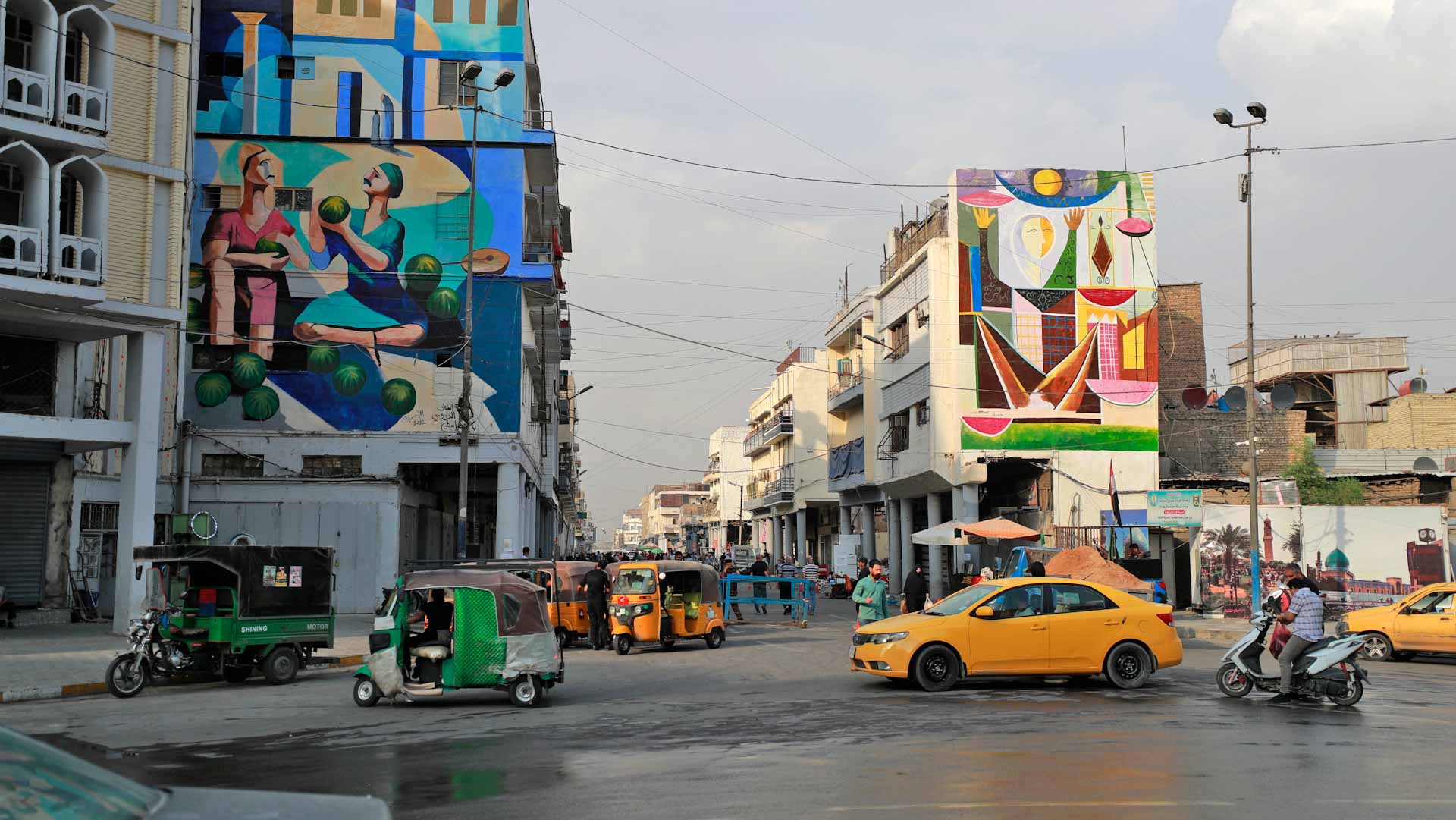 Image for the title: Murals bring 'joy' to Baghdad concrete jungle 