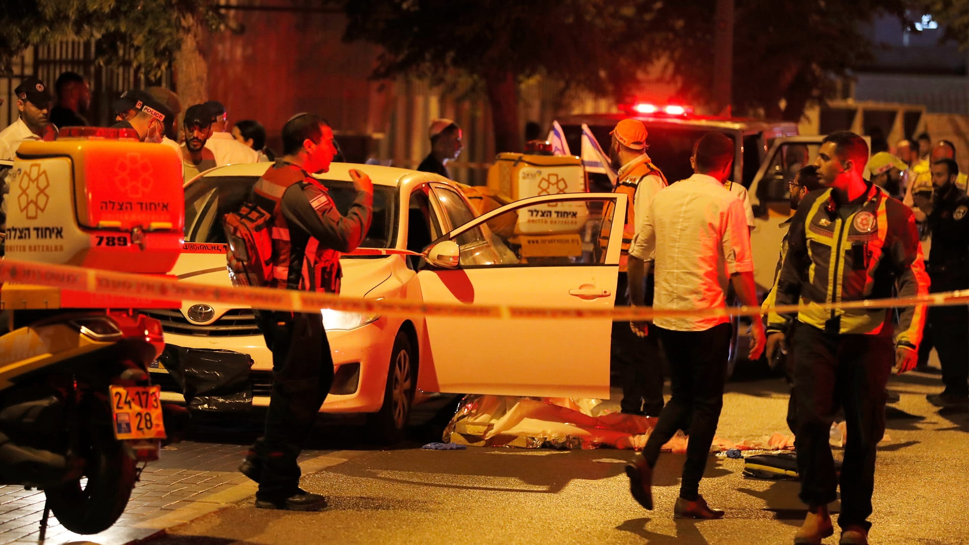 Image for the title: Three killed in attack in central Israel's Elad: medics 