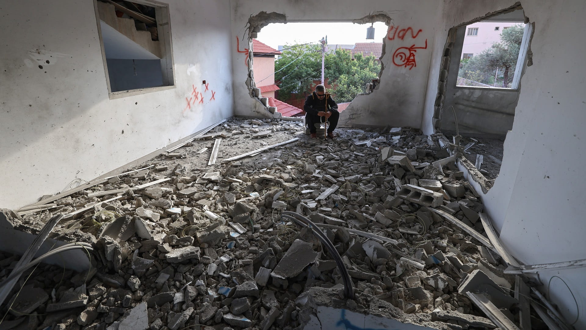 Image for the title: Israeli forces demolish home of Palestinian prisoner in Jenin 