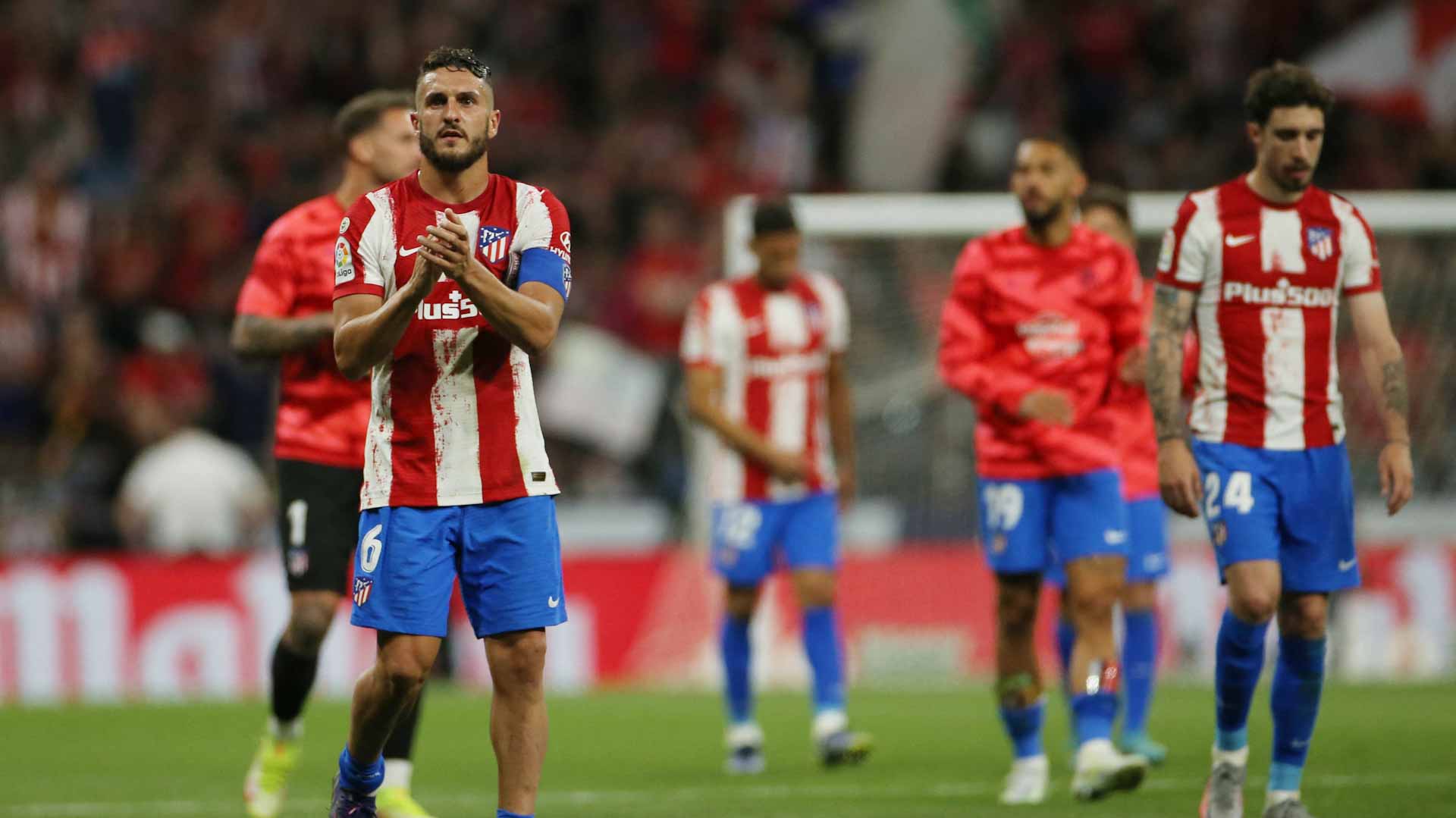 Image for the title: Atletico close in on Champions League spot with 1-0 Real win 