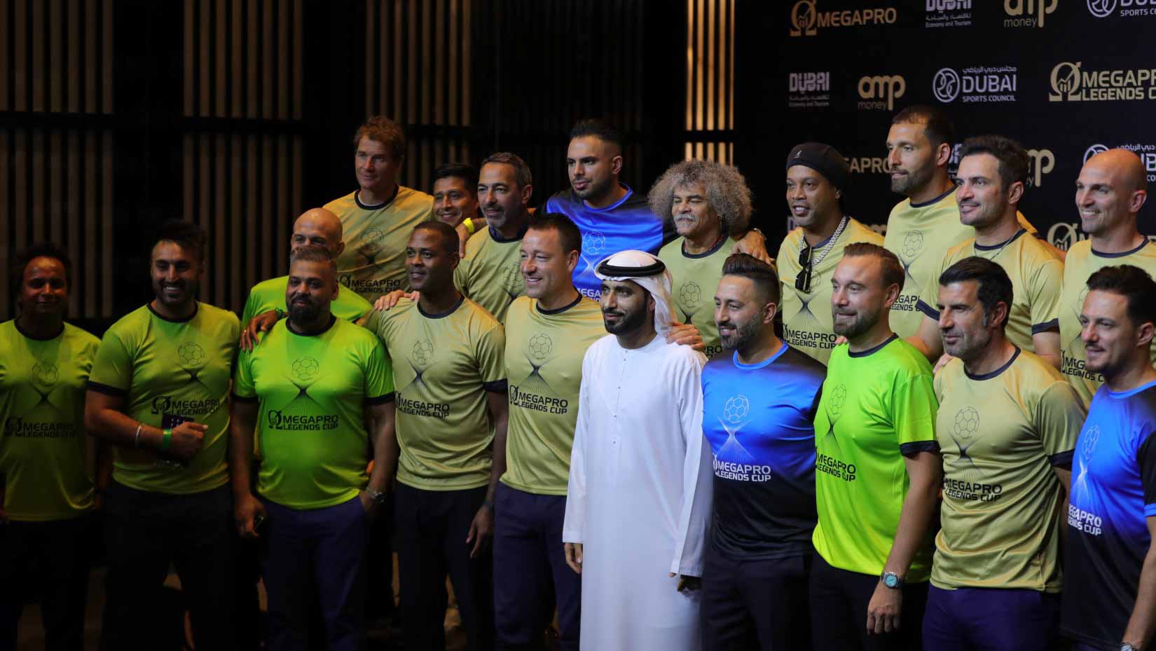 Image for the title: Brazil's Ronaldinho beats Portugal's Figo in front of Burj Khalifa 