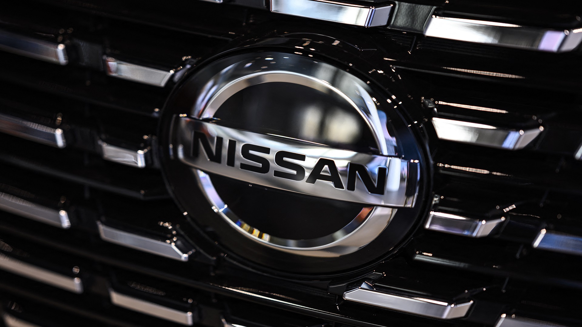 Image for the title: Nissan swings to Q4 profit, beats estimates 