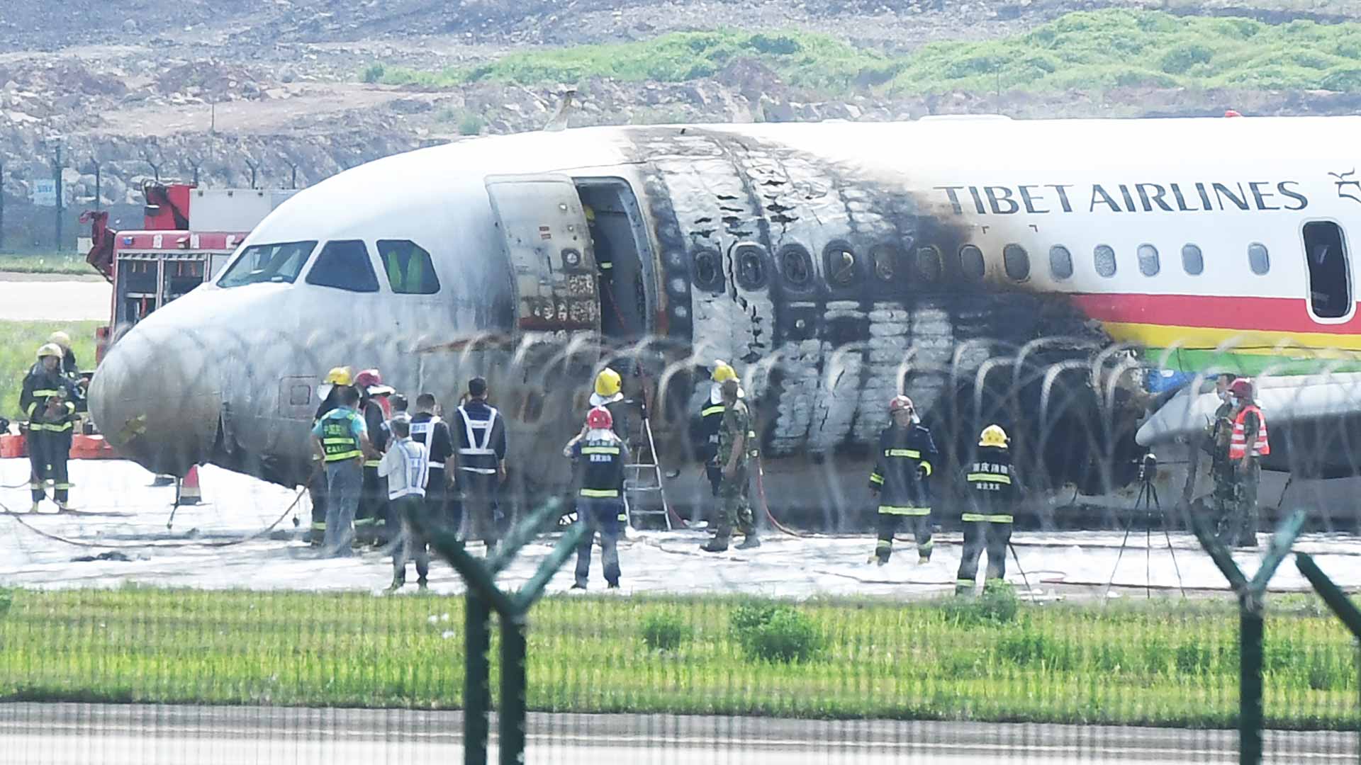 Image for the title: Tibet Airlines passenger jet catches fire 