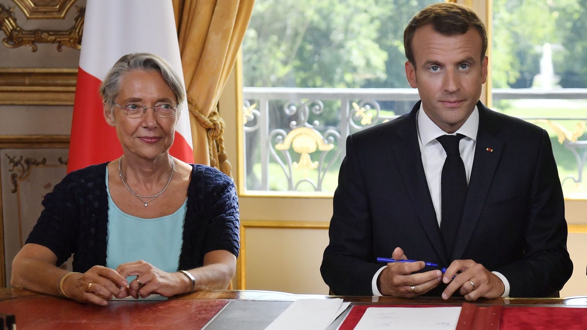 Image for the title: Macron names first French female PM in three decades 