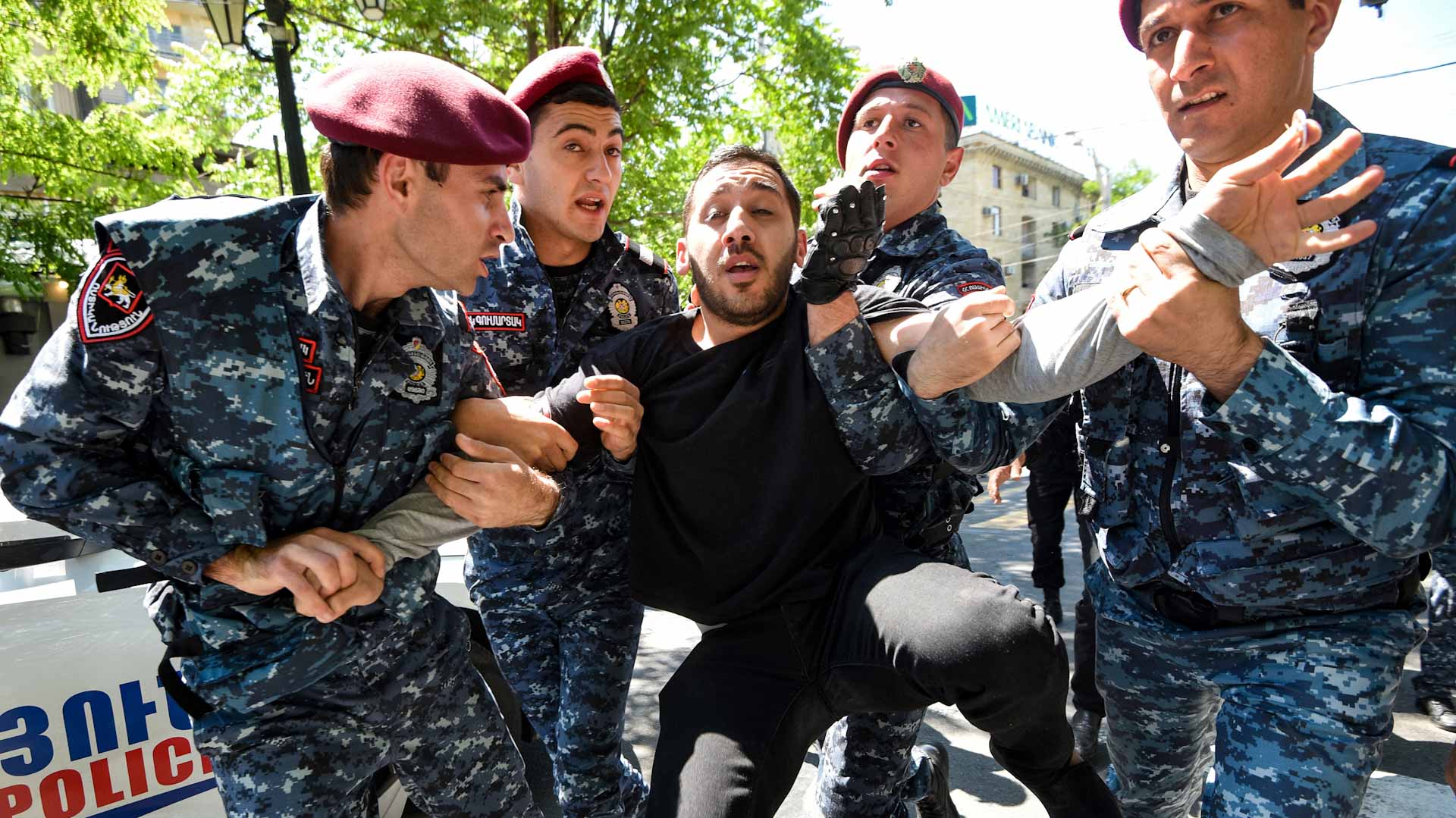 Image for the title: Mass arrests in Armenia as opposition protests spread 