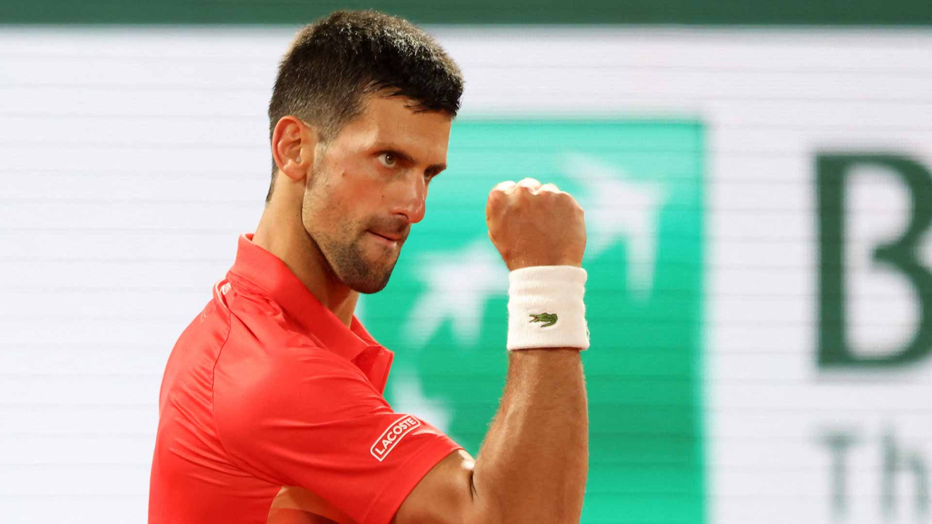 Image for the title: Holder Djokovic eases past Nishioka into round two at French Open 