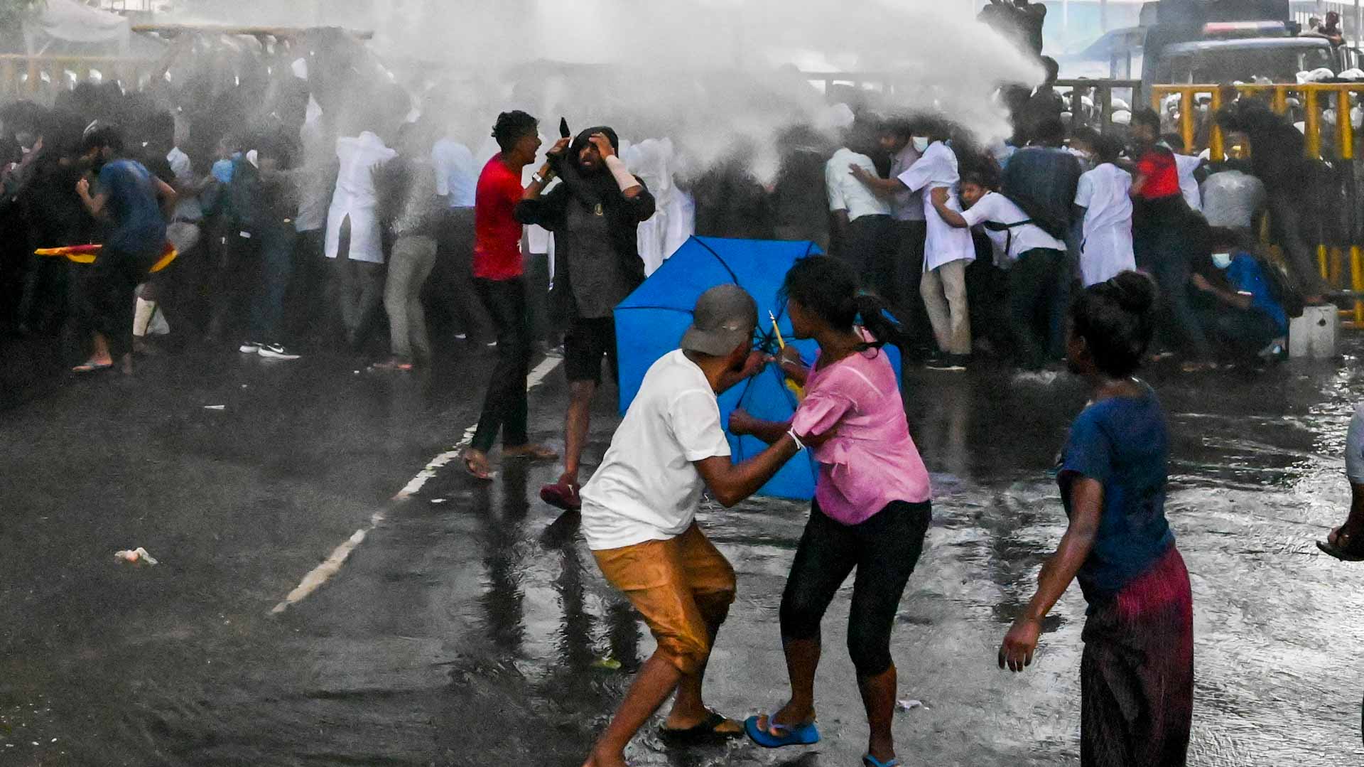 Image for the title: Sri Lanka police tear-gas students in fresh clashes 