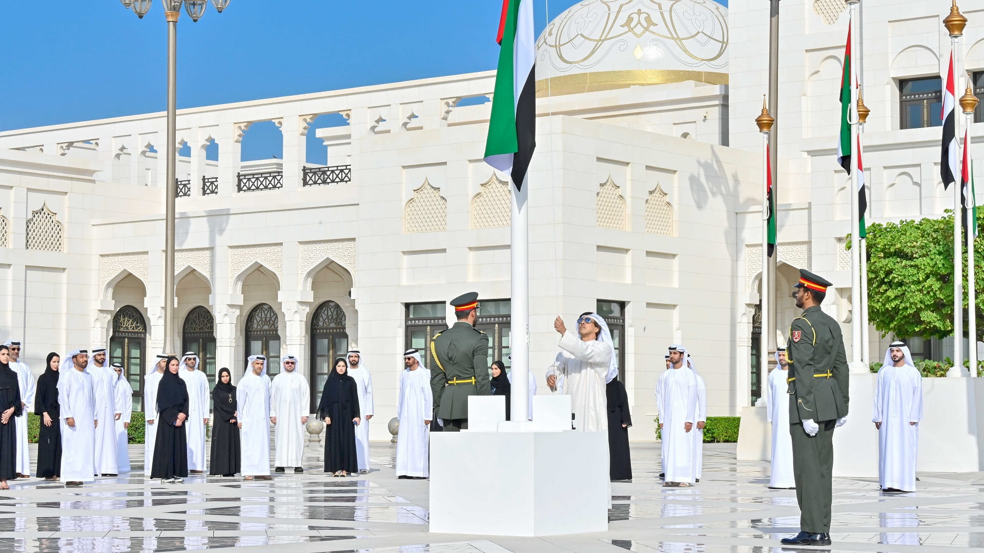 Image for the title: Mansour bin Zayed raises UAE Flag at ceremony at Qasr Al Watan 