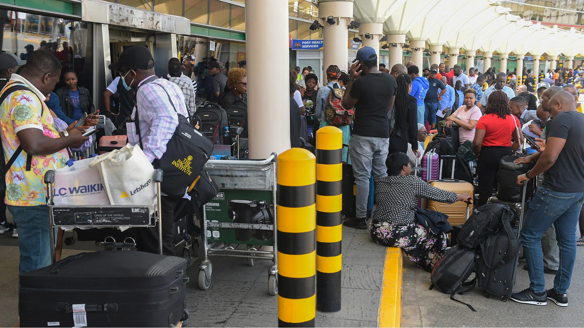 Image for the title: Around 10,000 passengers stranded as KQ pilots go on strike 