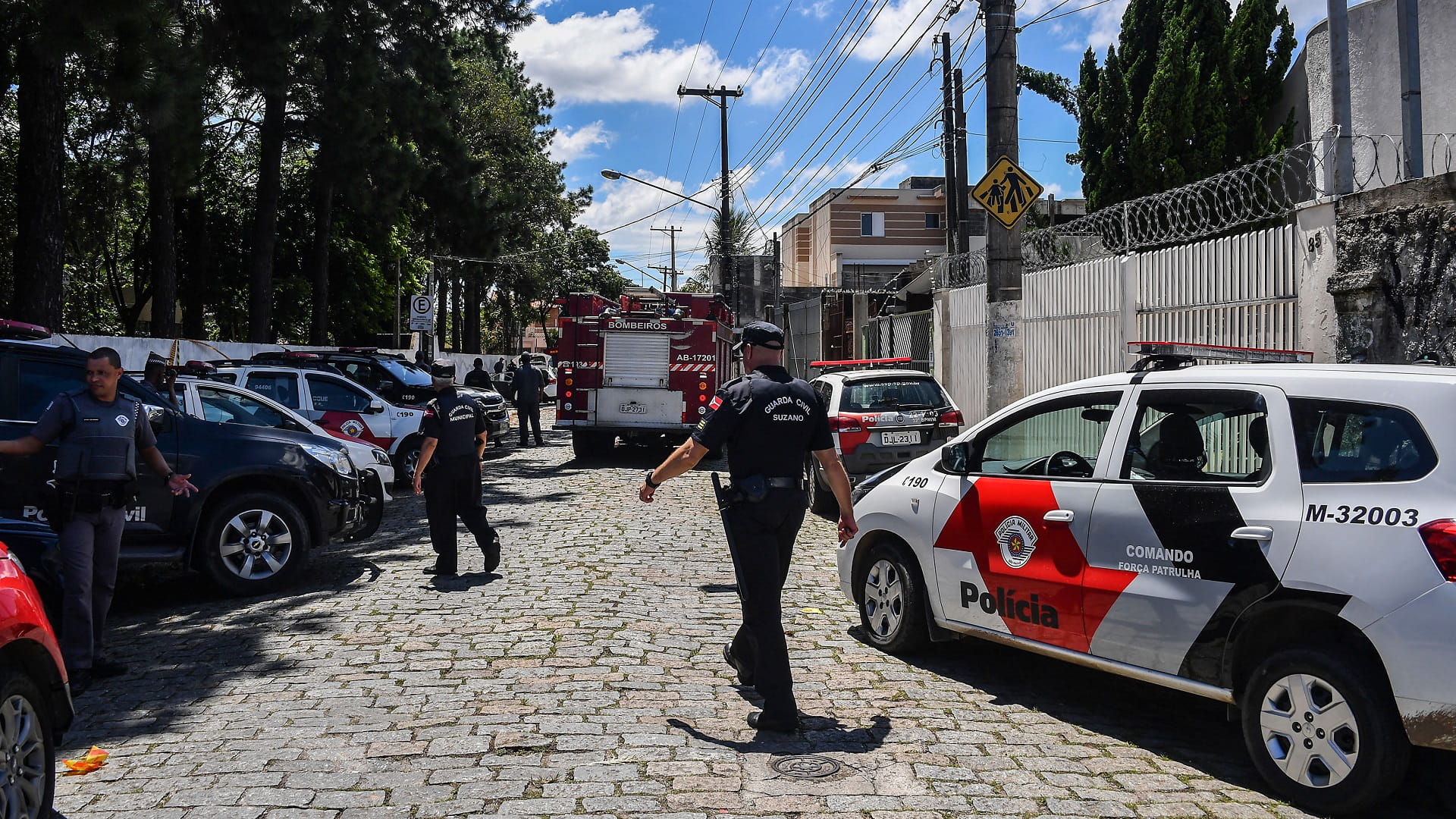 Image for the title: Three killed, 11 wounded in twin school shootings in Brazil 