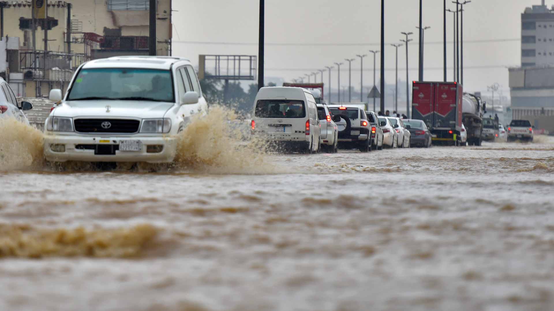 Image for the title: Saudi storm closes schools, cuts main road to Mecca 