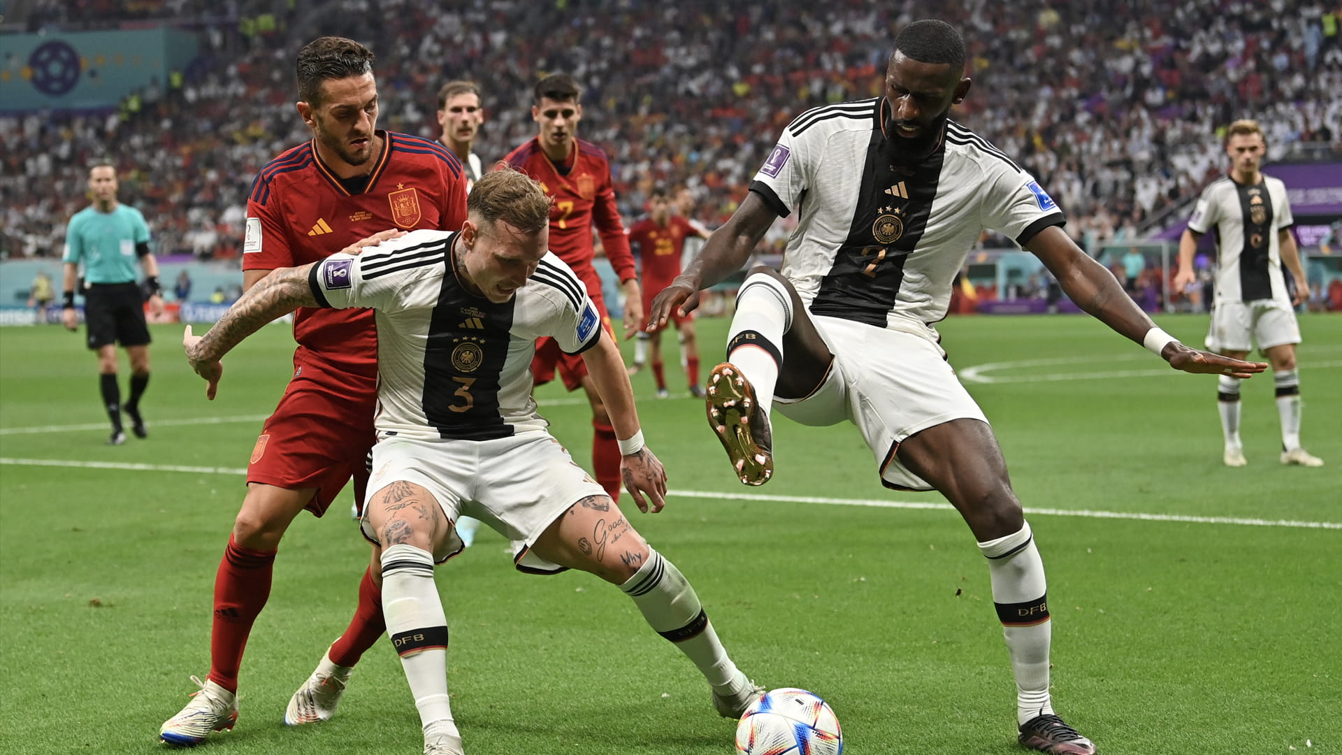 Image for the title: Germany snatch draw with Spain at World Cup 