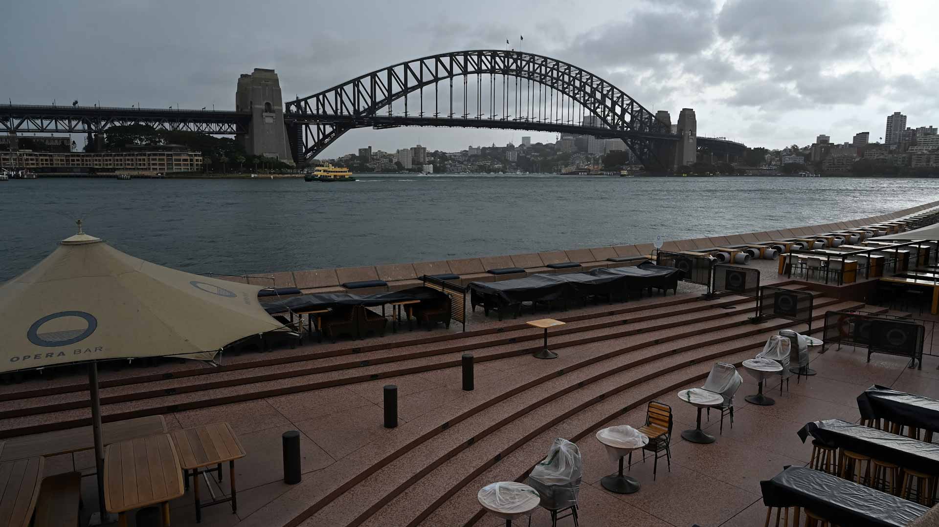 Image for the title: Australia lowers terror threat level for first time since 2014 