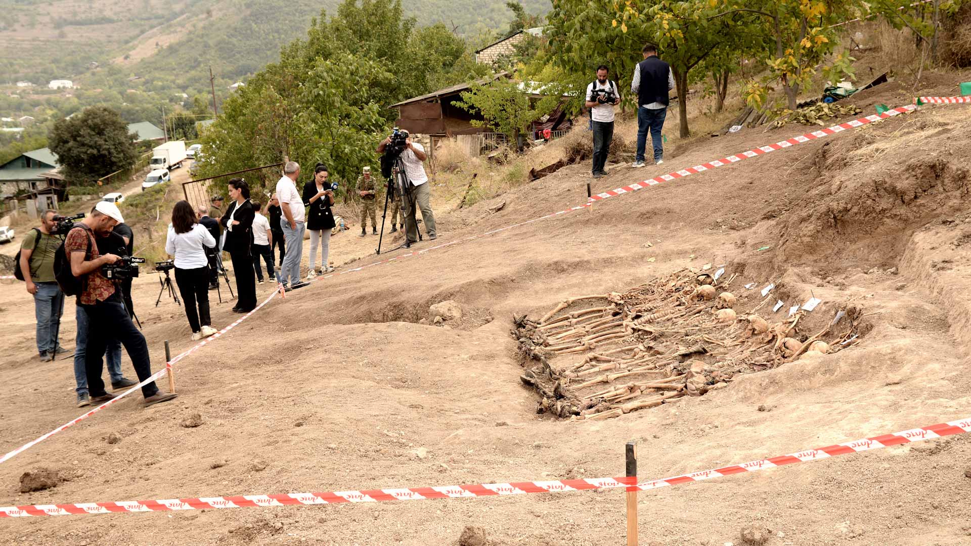 Image for the title: Azerbaijan says discovered mass grave in Karabakh 