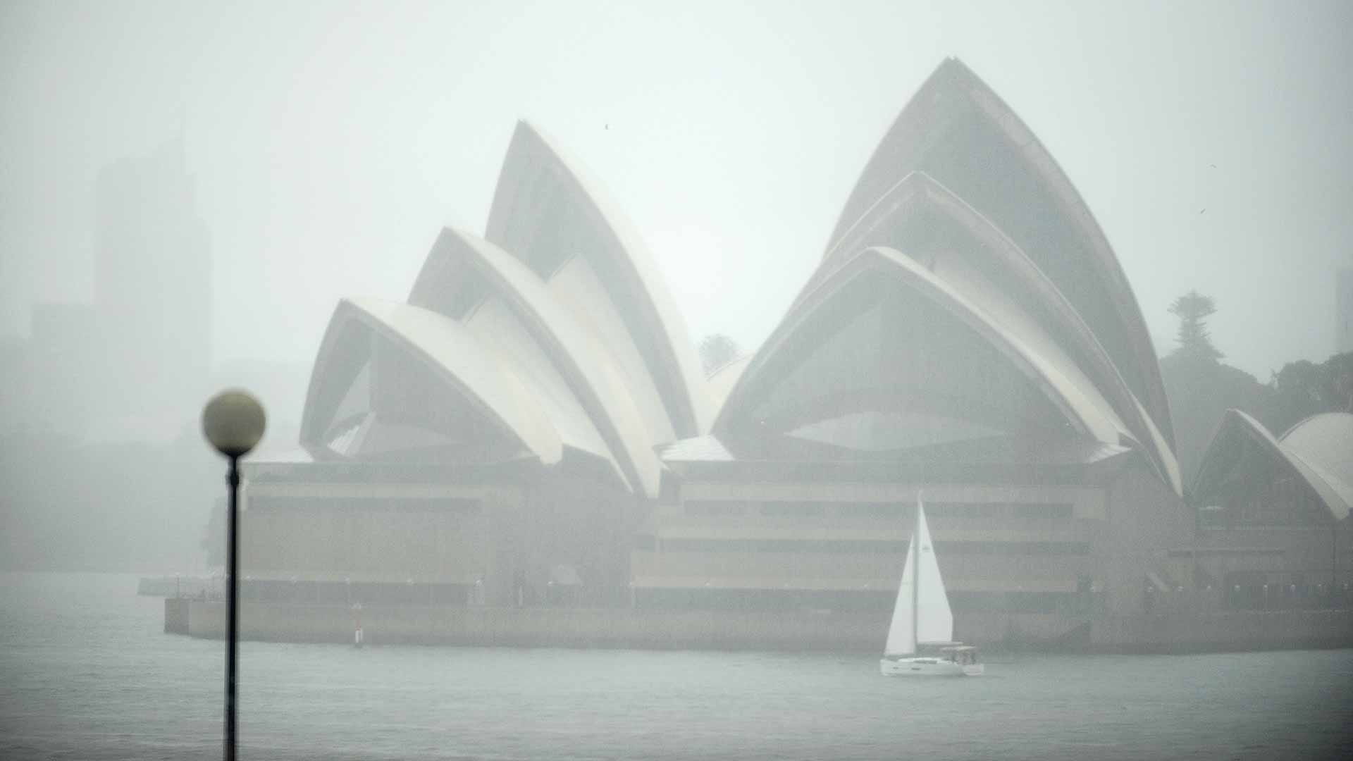 Image for the title: Rain-lashed Sydney residents warned to evacuate 