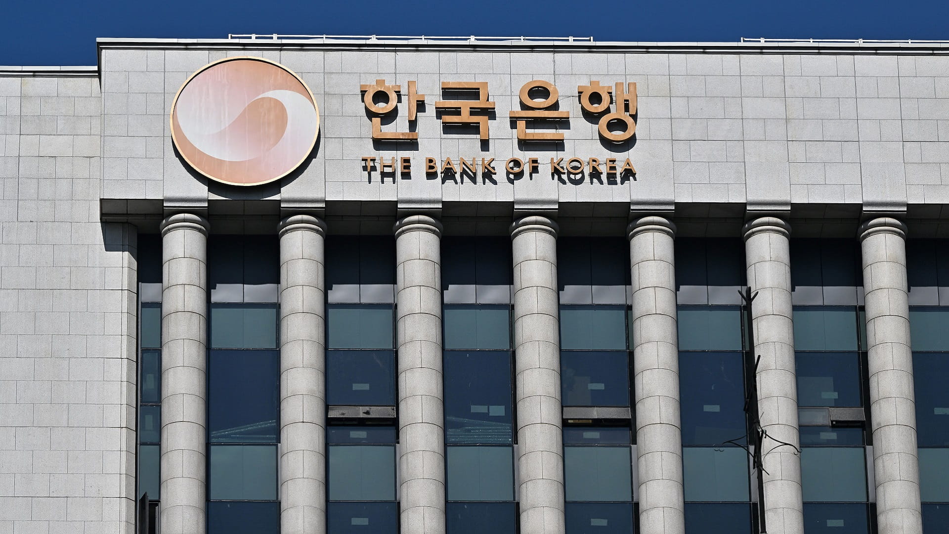 Image for the title: South Korea raises interest rate to tame inflation, support won 