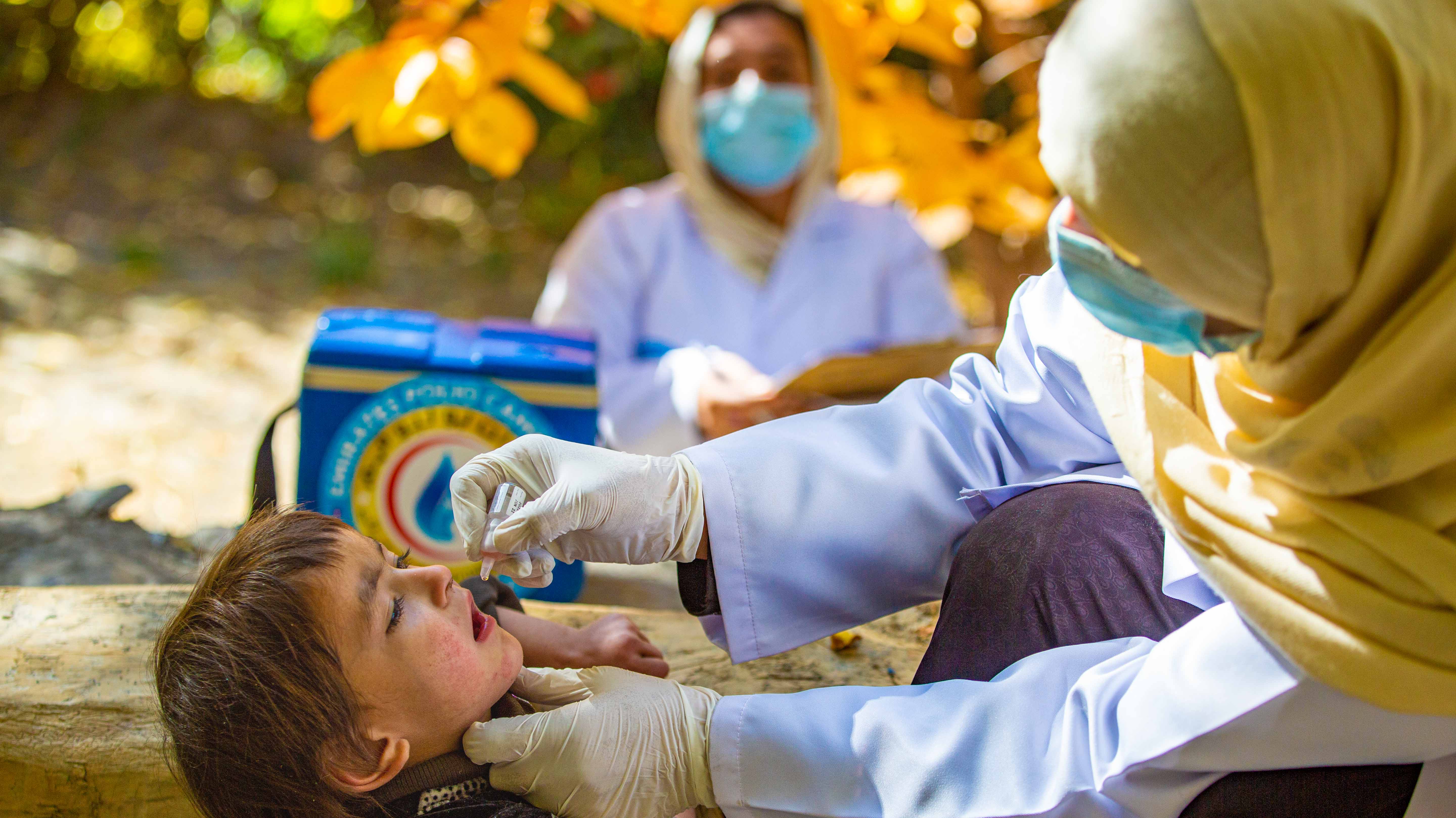 Image for the title: UAE PAP administers polio vaccine doses to children in Pakistan 