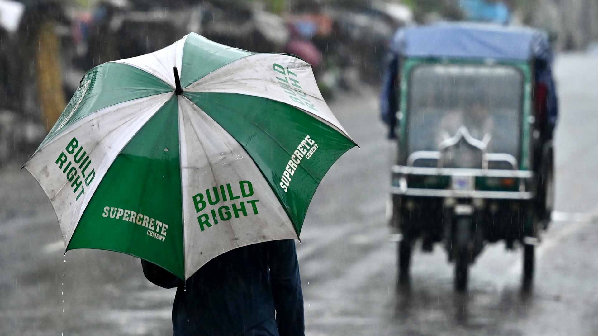 Image for the title: Nine dead, millions seek refuge as cyclone hits Bangladesh 