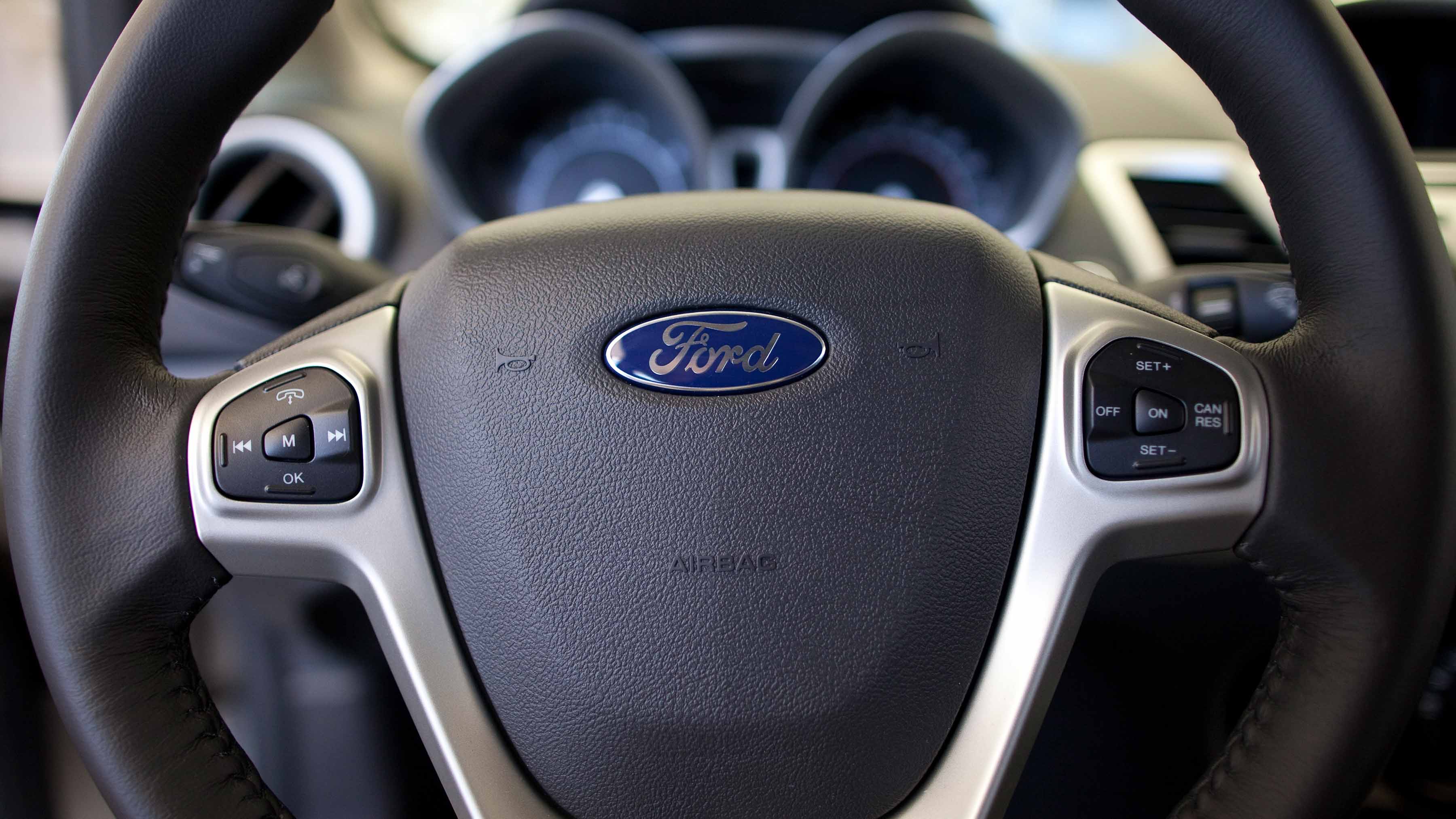 Image for the title: Ford posts loss, takes turn away from automated driving 