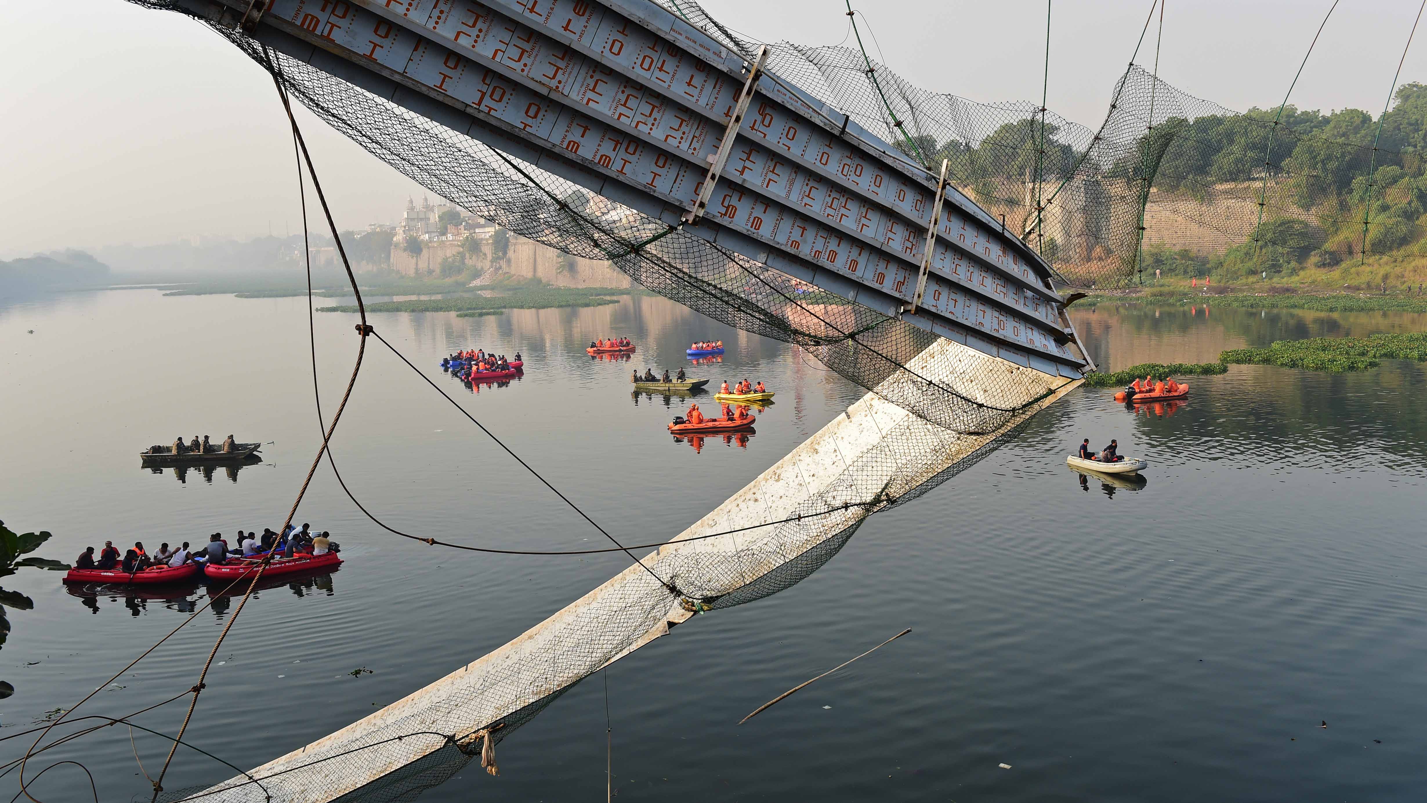 Image for the title: Death toll from India bridge collapse rises to 132 