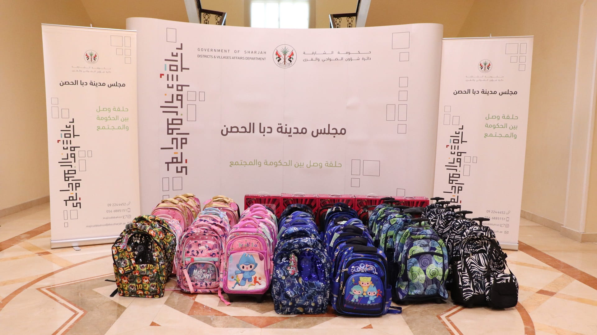 Image for the title: Dibba Al Hisn Council distributes school bags to needy families 