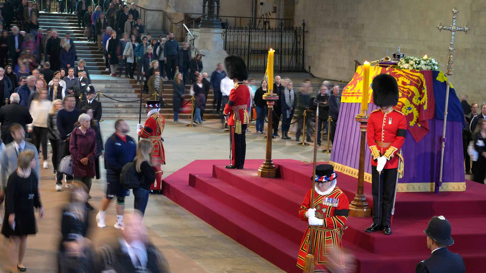 Image for the title: Beckham joins thousands in queue for queen's coffin 