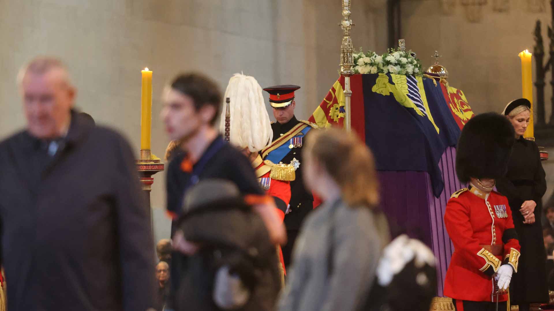 Image for the title: William and Harry stand vigil with cousins at queen's coffin 