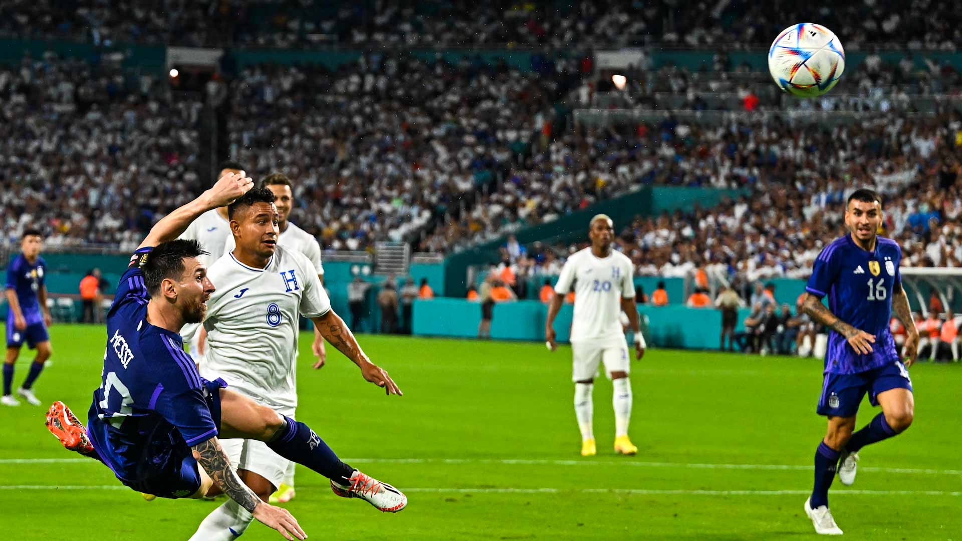 Image for the title: Messi scores twice as Argentina down Honduras 