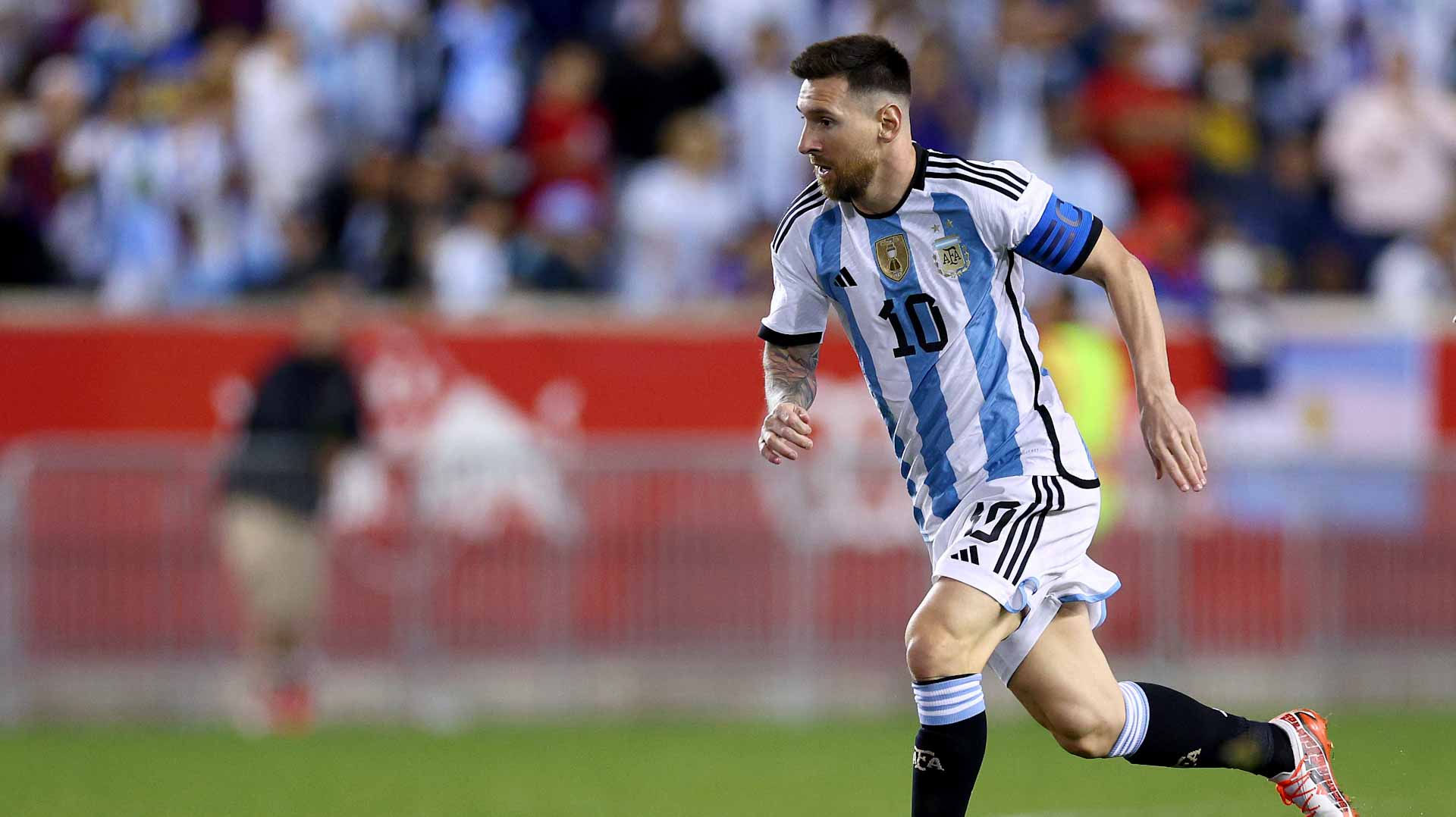 Image for the title: Messi comes off bench to notch double as Argentina beat Jamaica 