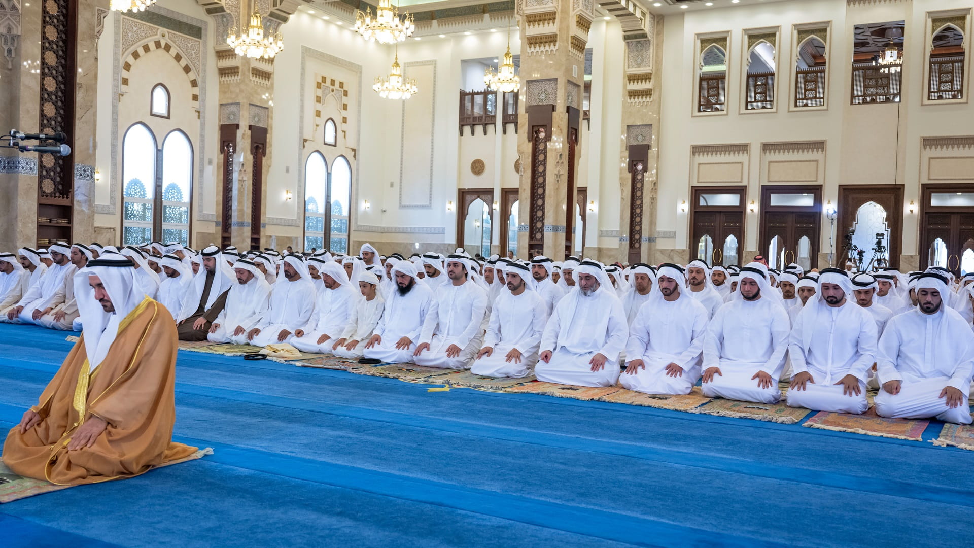 Image for the title: Hamdan and Maktoum bin Mohammed perform Eid Al Fitr prayer 