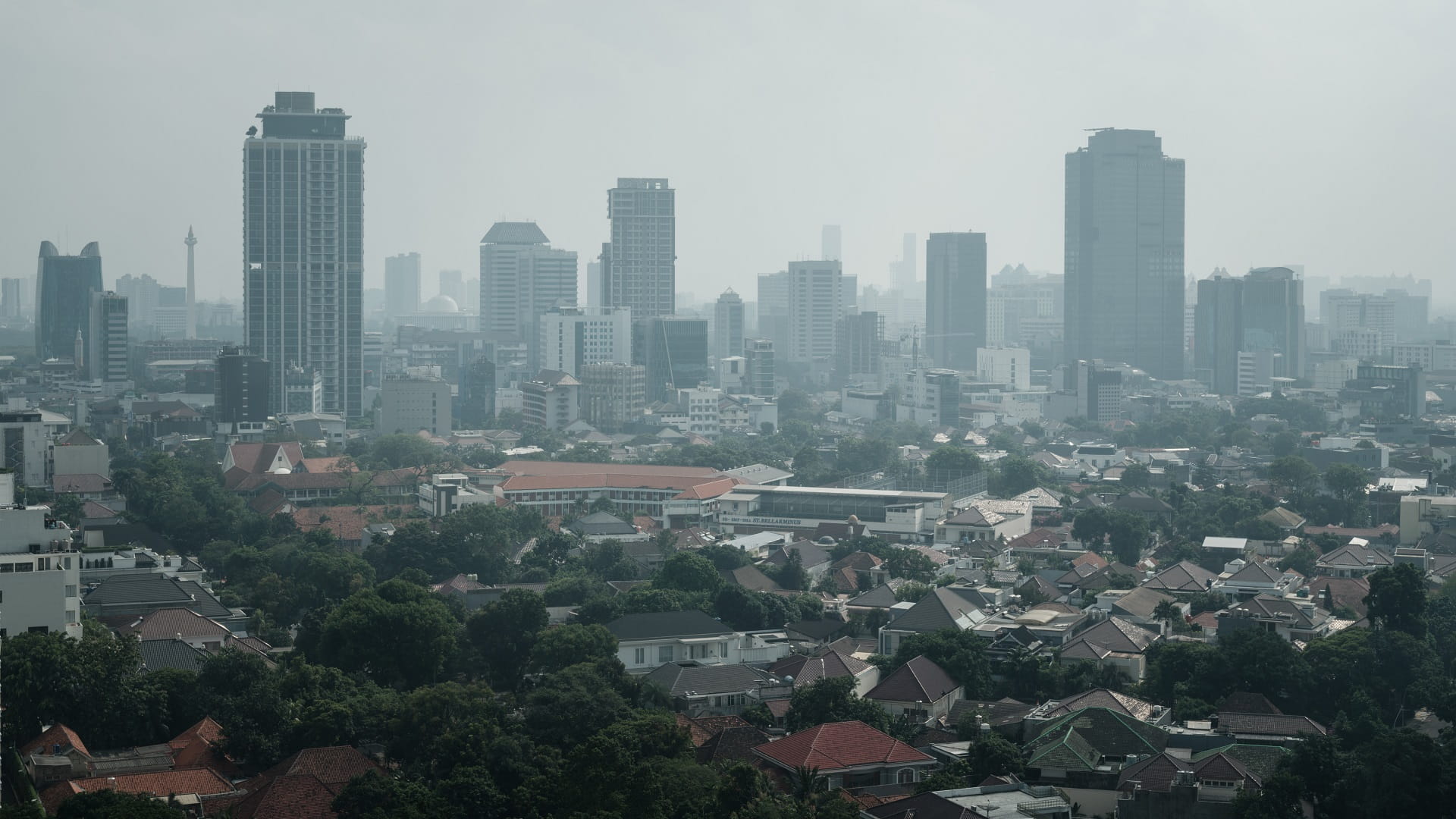 Image for the title: Indonesia capital hit by major pollution spikes 