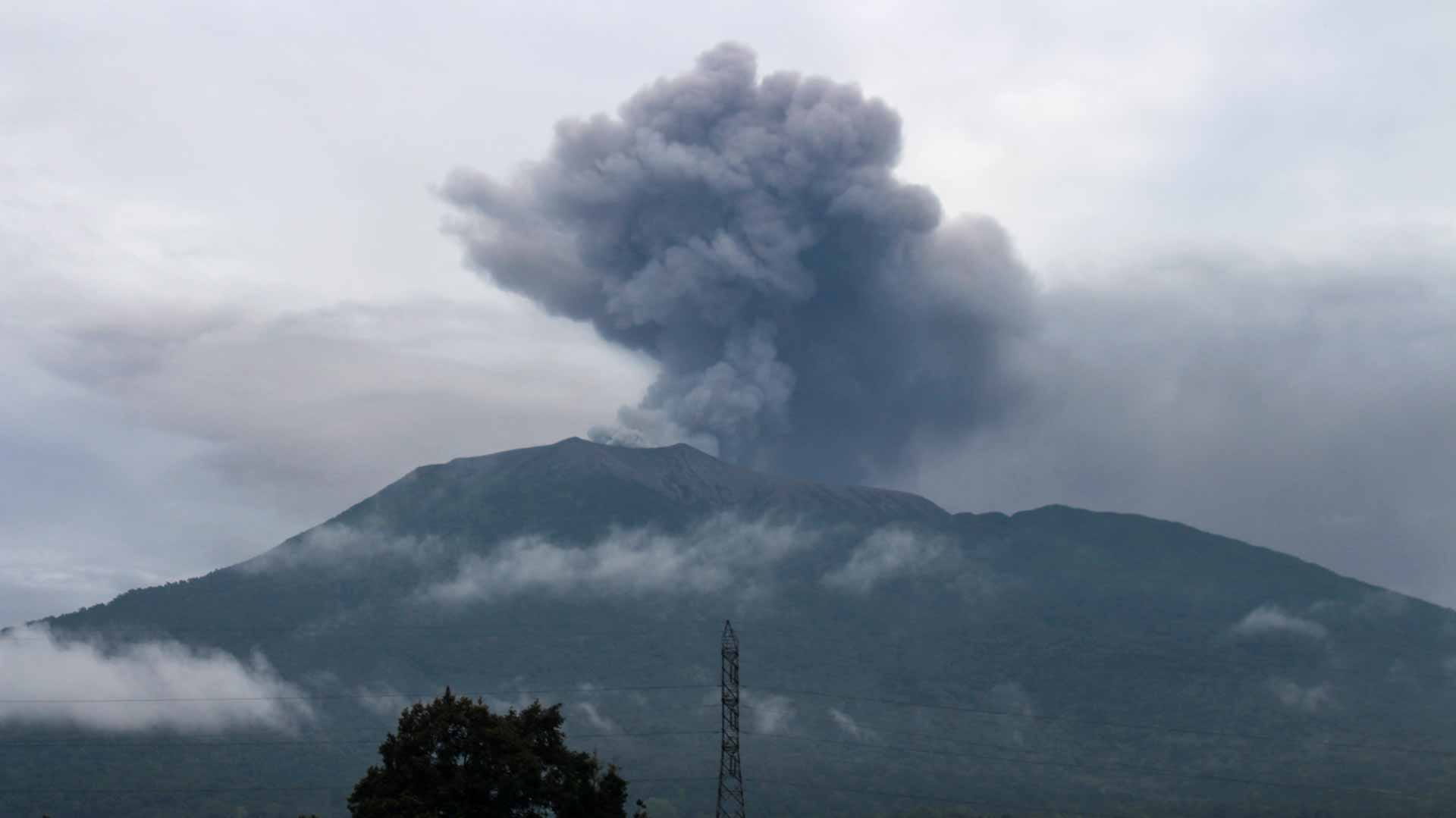 Image for the title: Indonesia volcano death toll rises to 13 