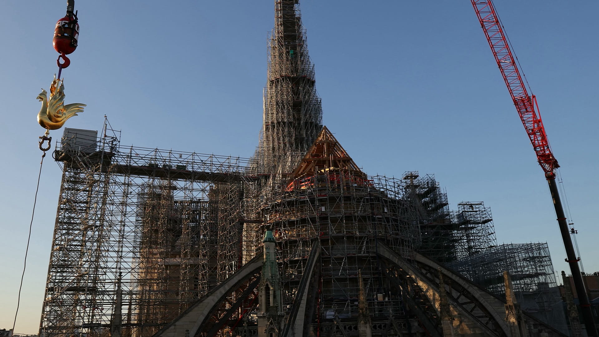 New Golden Rooster Fitted To Spire Of Paris' Notre Dame Cathedral