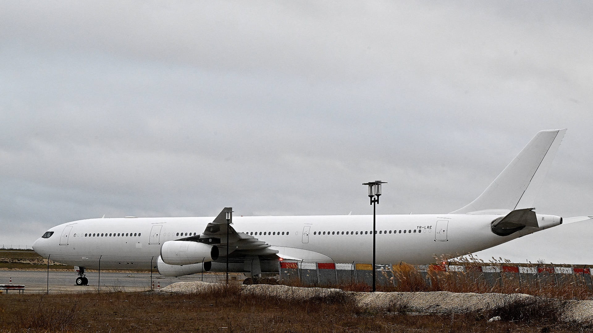 Image for the title: Held in France plane on trafficking concerns lands in India 